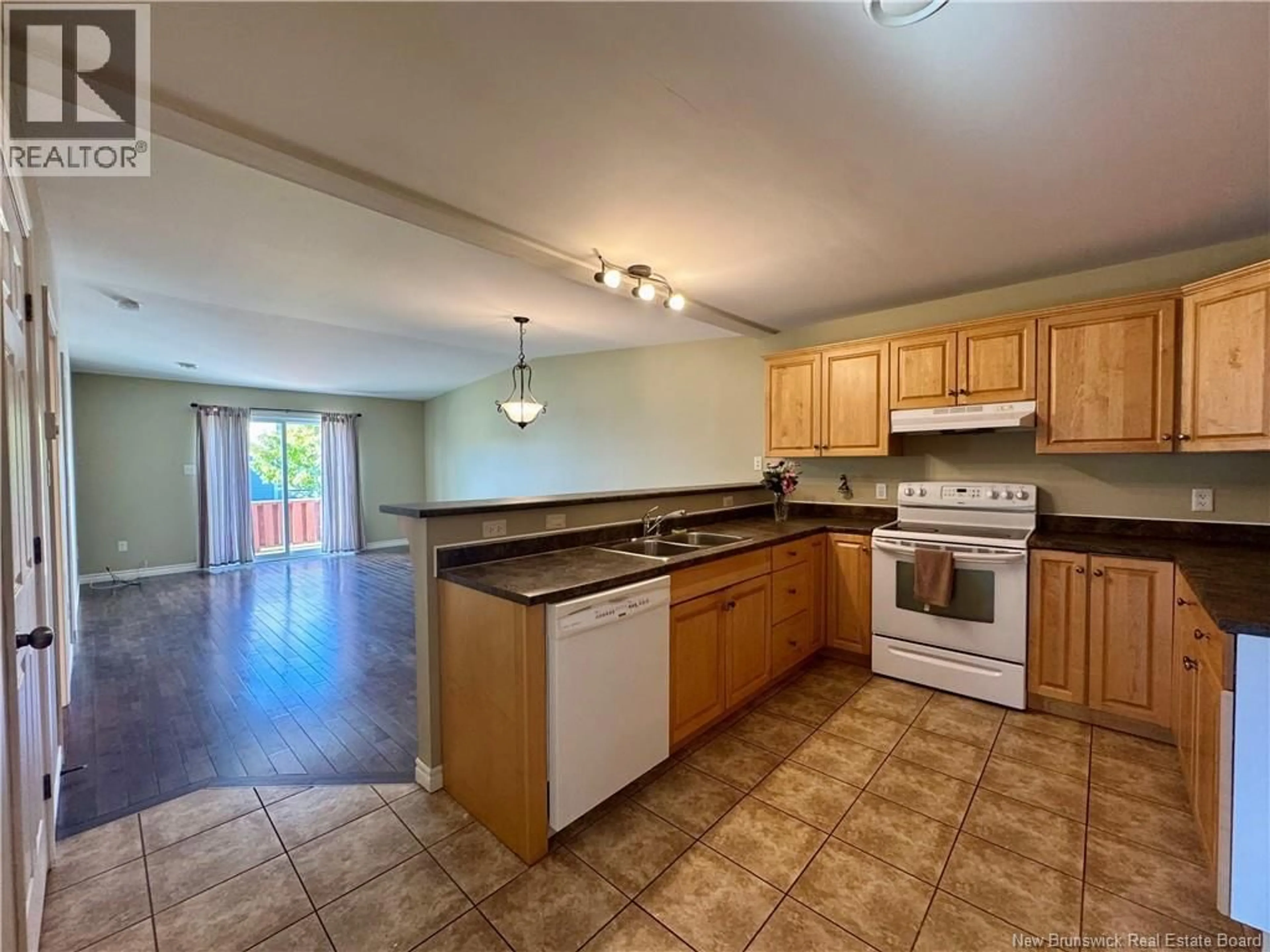Open concept kitchen, ceramic/tile floor for 26 ACORN DRIVE, Saint John New Brunswick E2M7X8