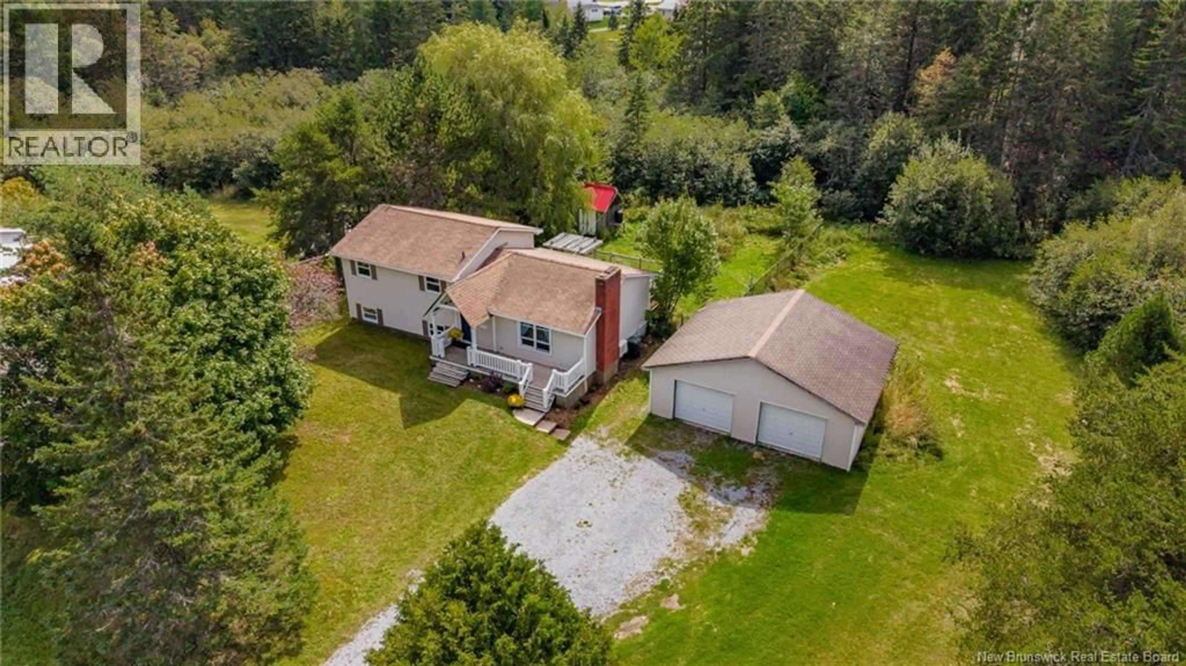A pic from outside/outdoor area/front of a property/back of a property/a pic from drone, street for 9 WOODWARD CRESCENT, Quispamsis New Brunswick E2E1N5