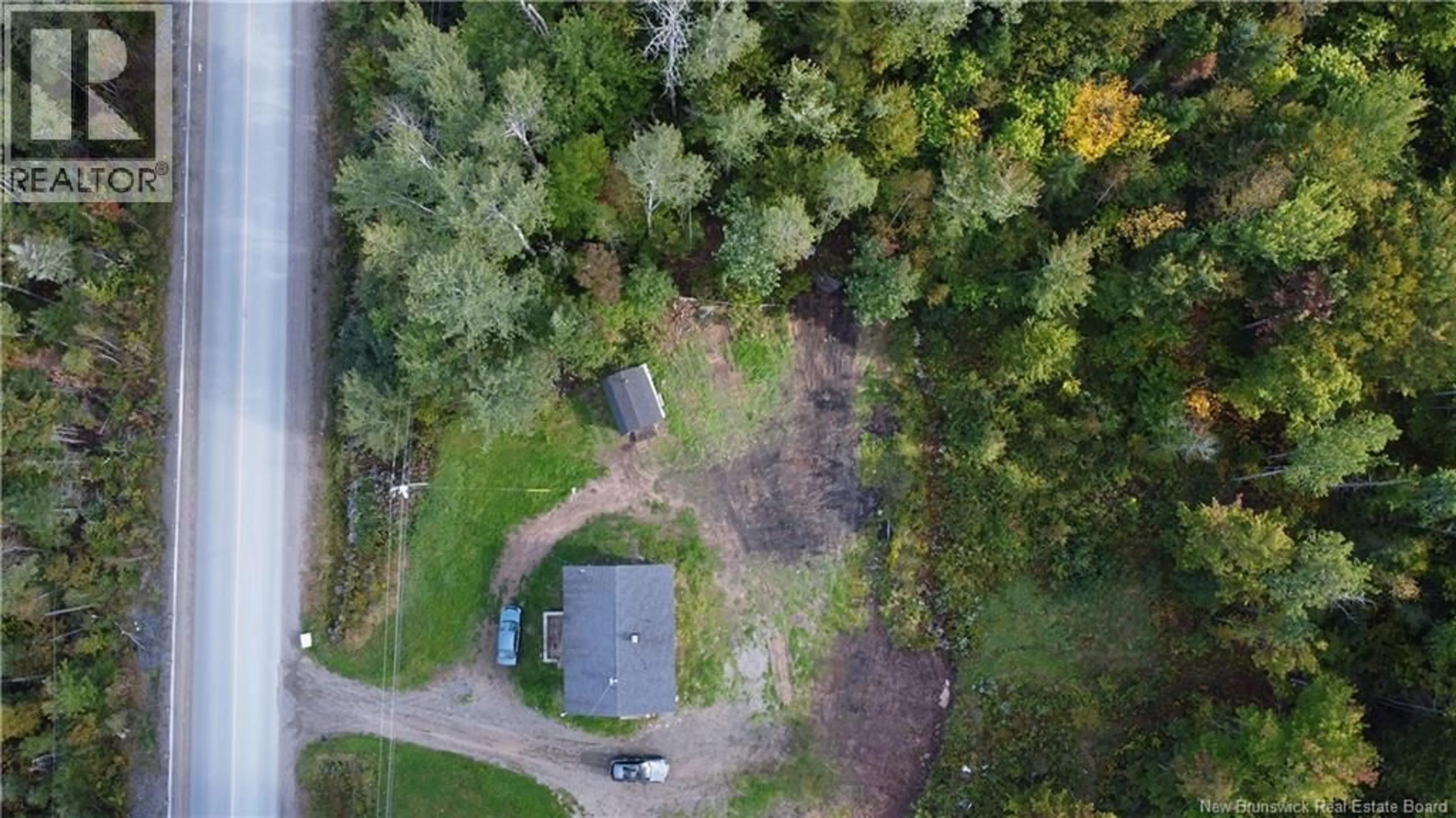 A pic from outside/outdoor area/front of a property/back of a property/a pic from drone, forest/trees view for 7714 ROUTE 101, Clarendon New Brunswick E5K4V2