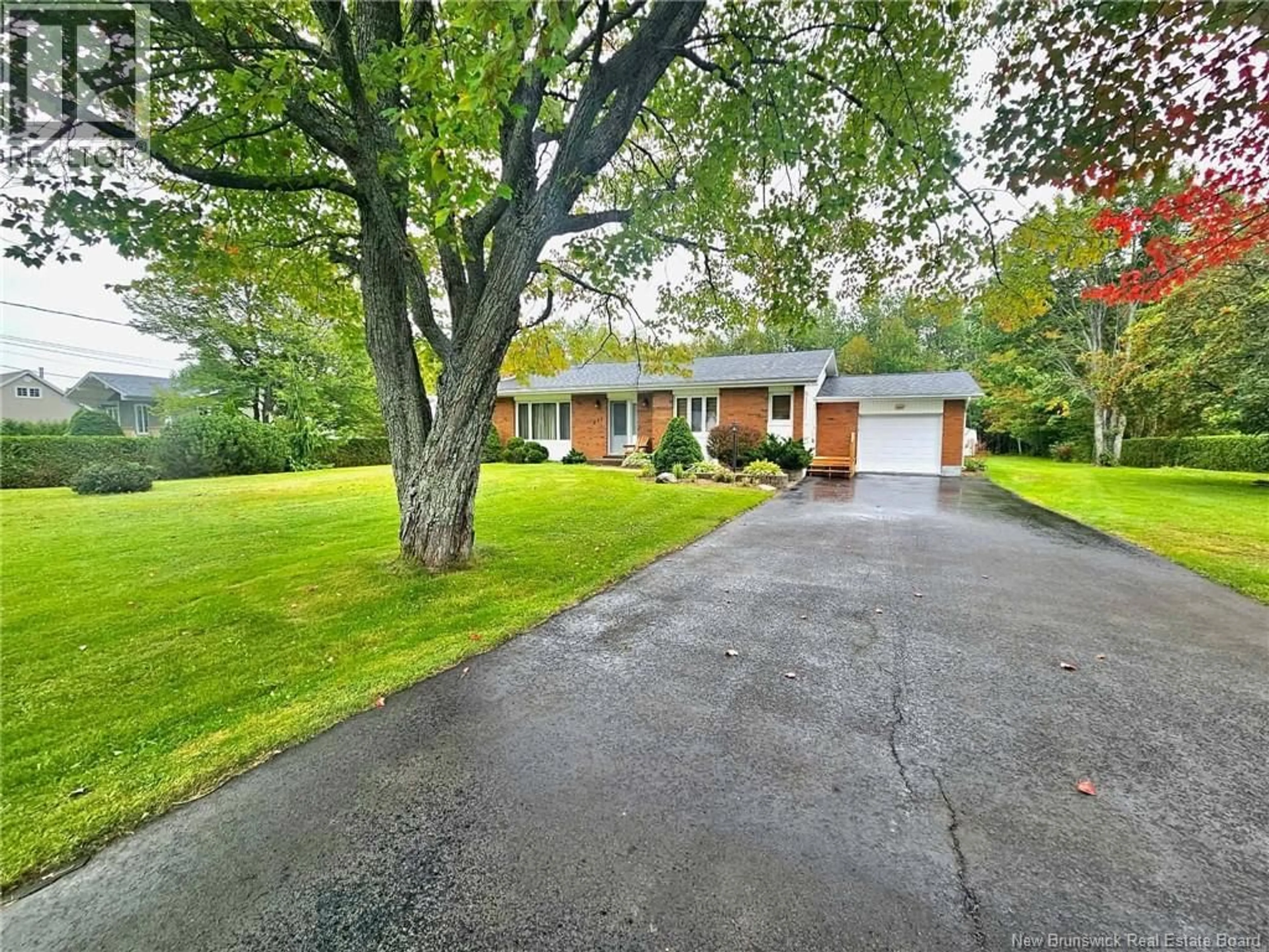 A pic from outside/outdoor area/front of a property/back of a property/a pic from drone, street for 251 LANDRY, Beresford New Brunswick E8K1G9