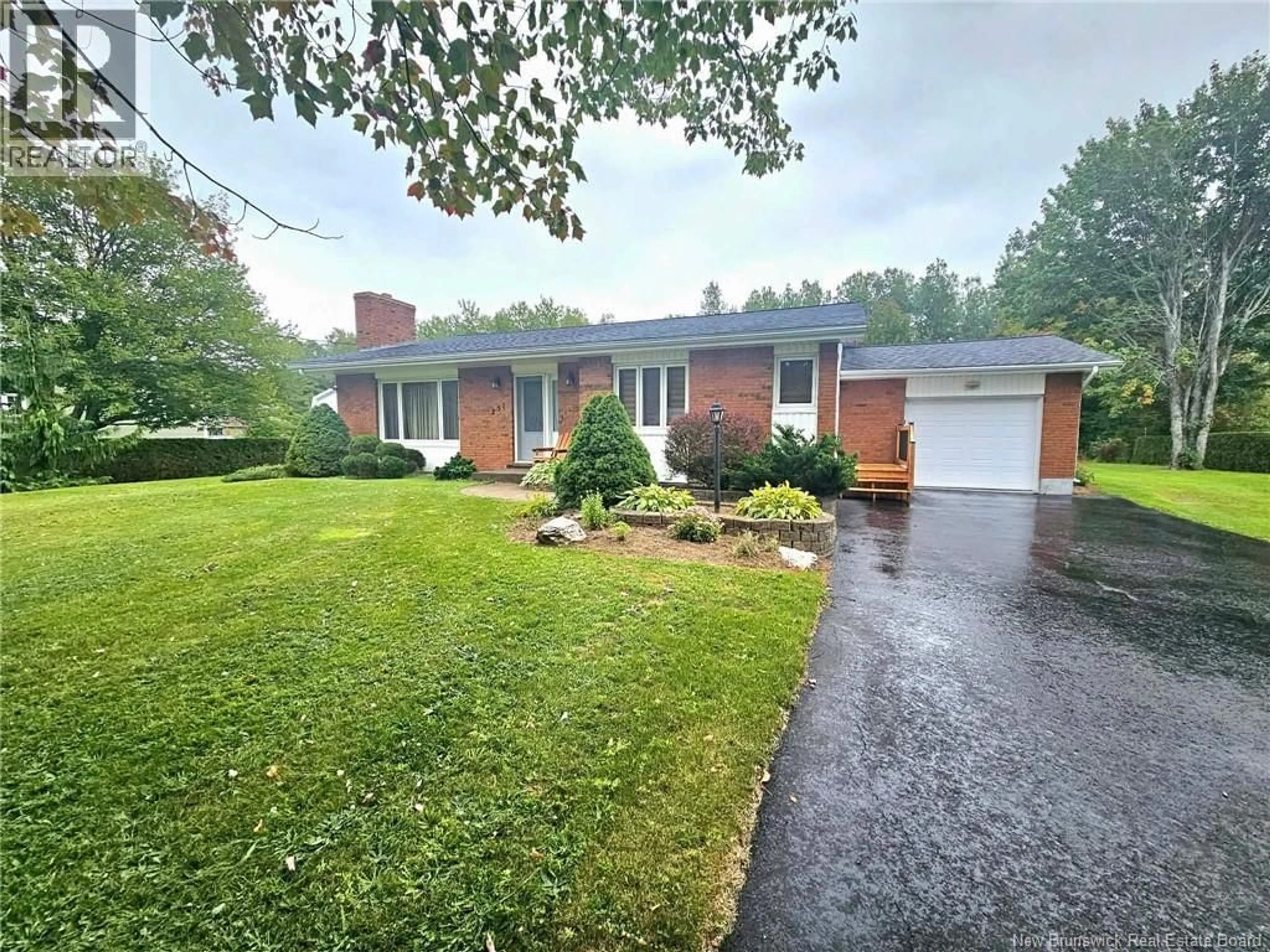 A pic from outside/outdoor area/front of a property/back of a property/a pic from drone, street for 251 LANDRY, Beresford New Brunswick E8K1G9