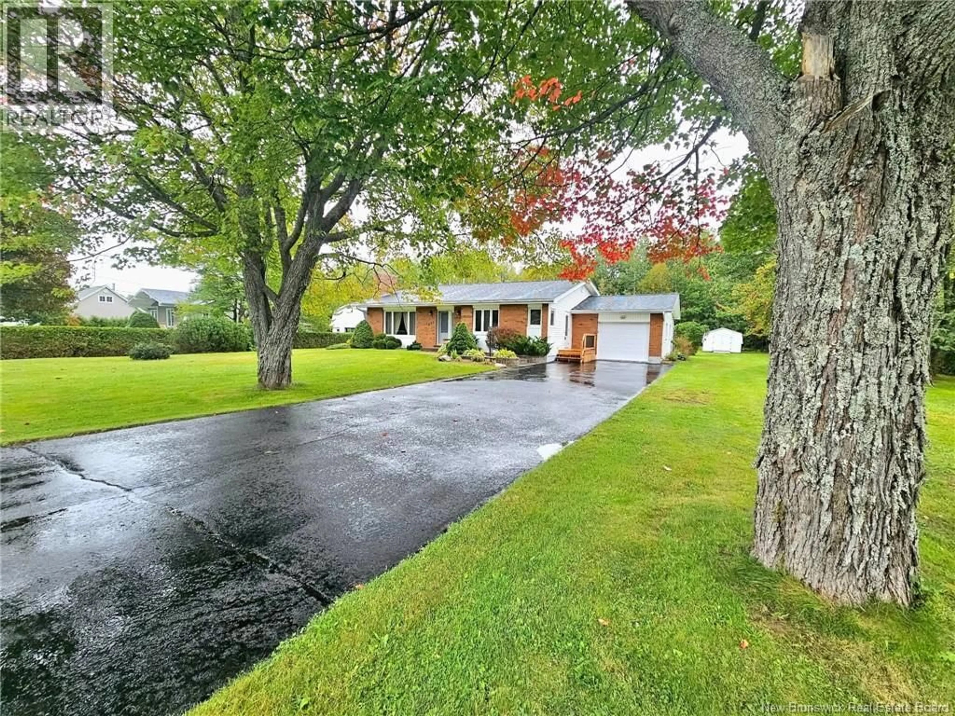 A pic from outside/outdoor area/front of a property/back of a property/a pic from drone, street for 251 LANDRY, Beresford New Brunswick E8K1G9
