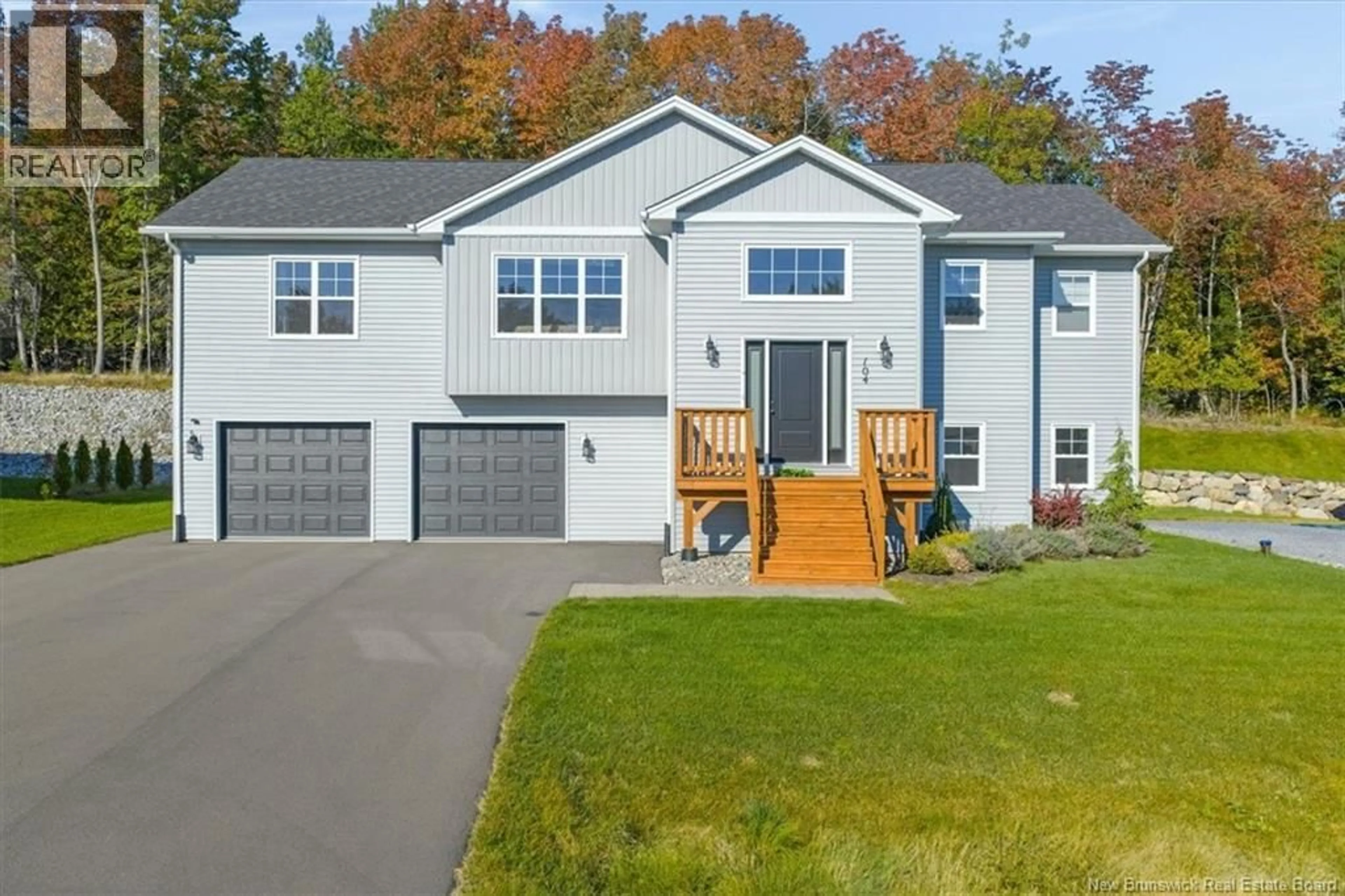 Home with vinyl exterior material, street for 104 MONTANA DRIVE, Quispamsis New Brunswick E2E0R1