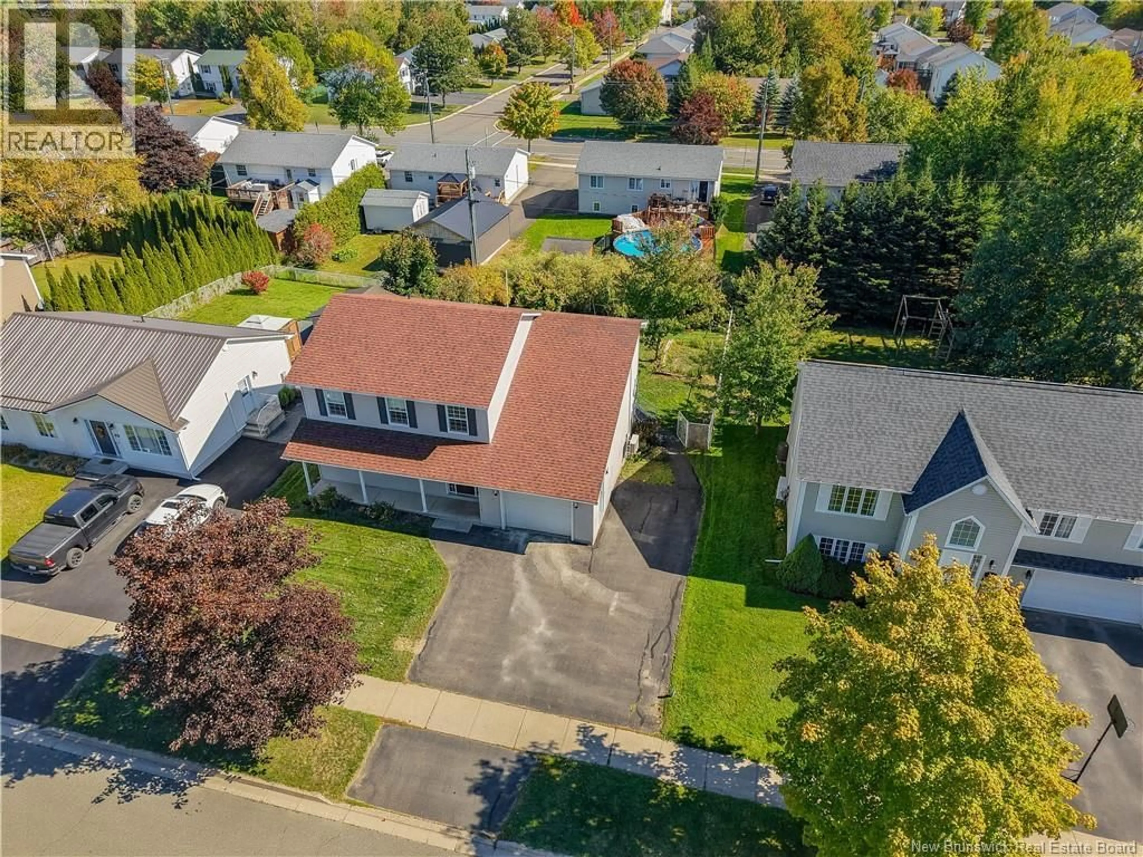 A pic from outside/outdoor area/front of a property/back of a property/a pic from drone, street for 74 REBECCA DRIVE, Fredericton New Brunswick E3B9N4