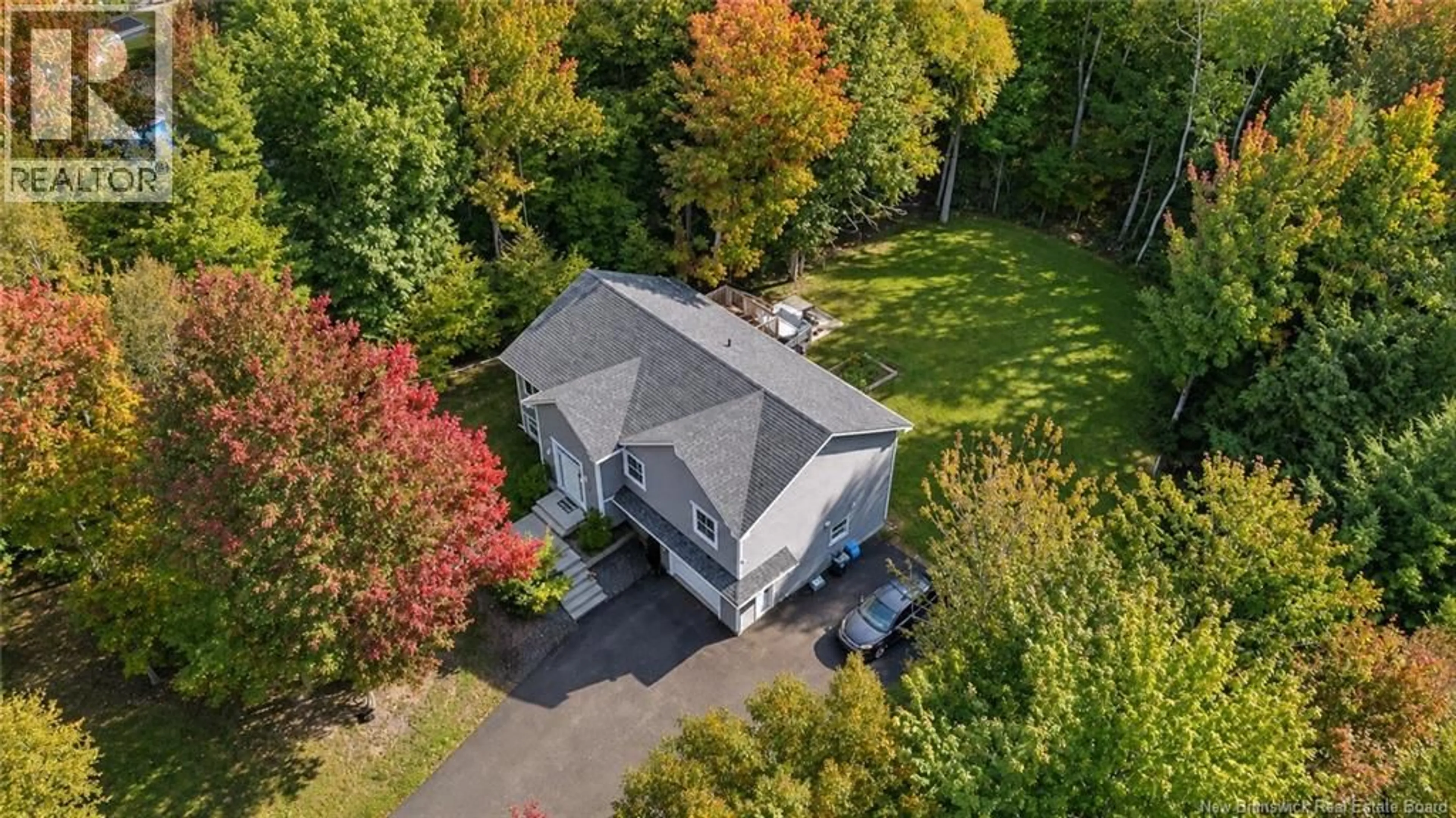 A pic from outside/outdoor area/front of a property/back of a property/a pic from drone, street for 128 COUNTRY WOOD LANE, Richibucto Road New Brunswick E3A0Y6