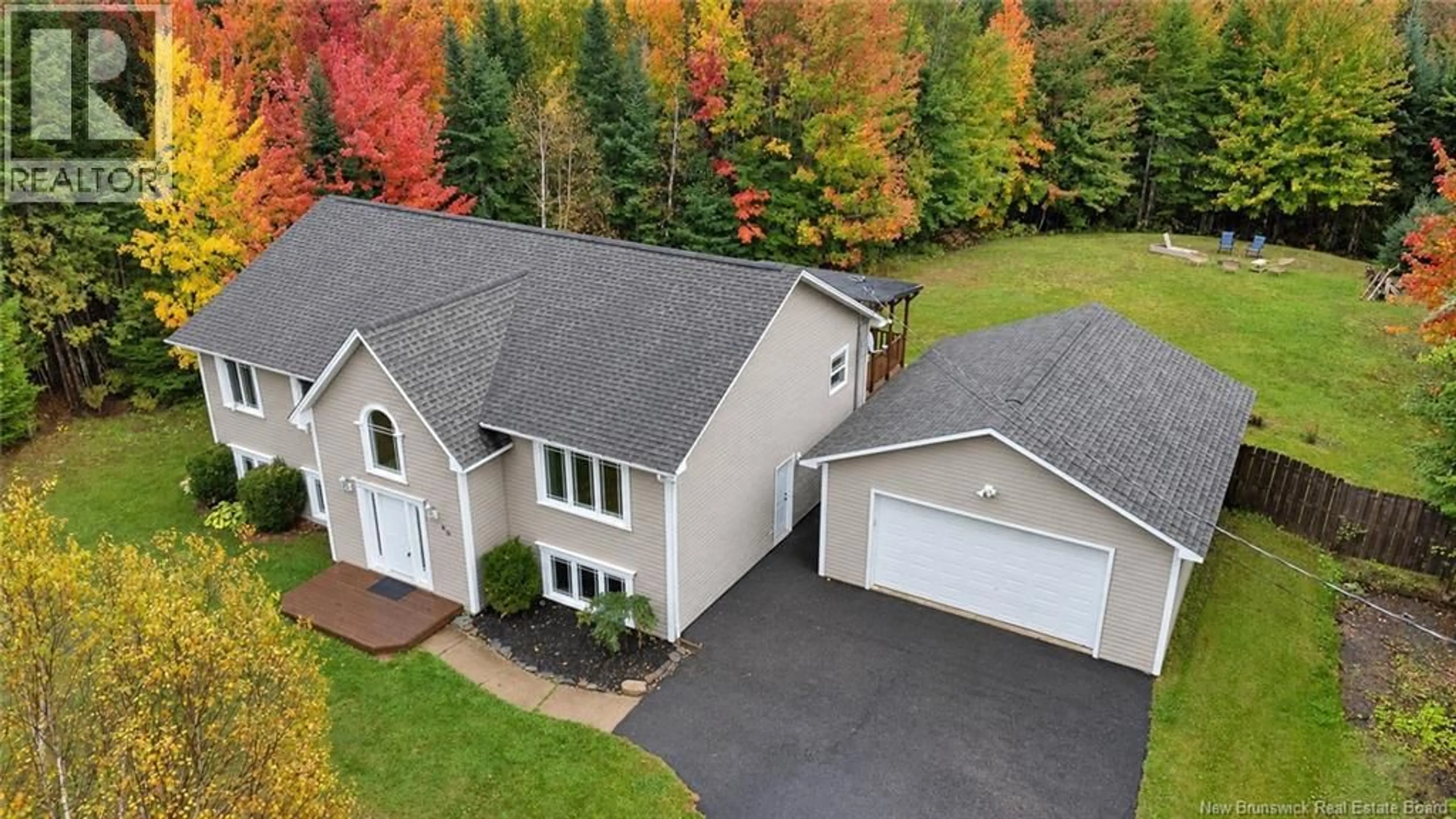 A pic from outside/outdoor area/front of a property/back of a property/a pic from drone, street for 69 WILDWOOD WAY, Burton New Brunswick E2V0G6