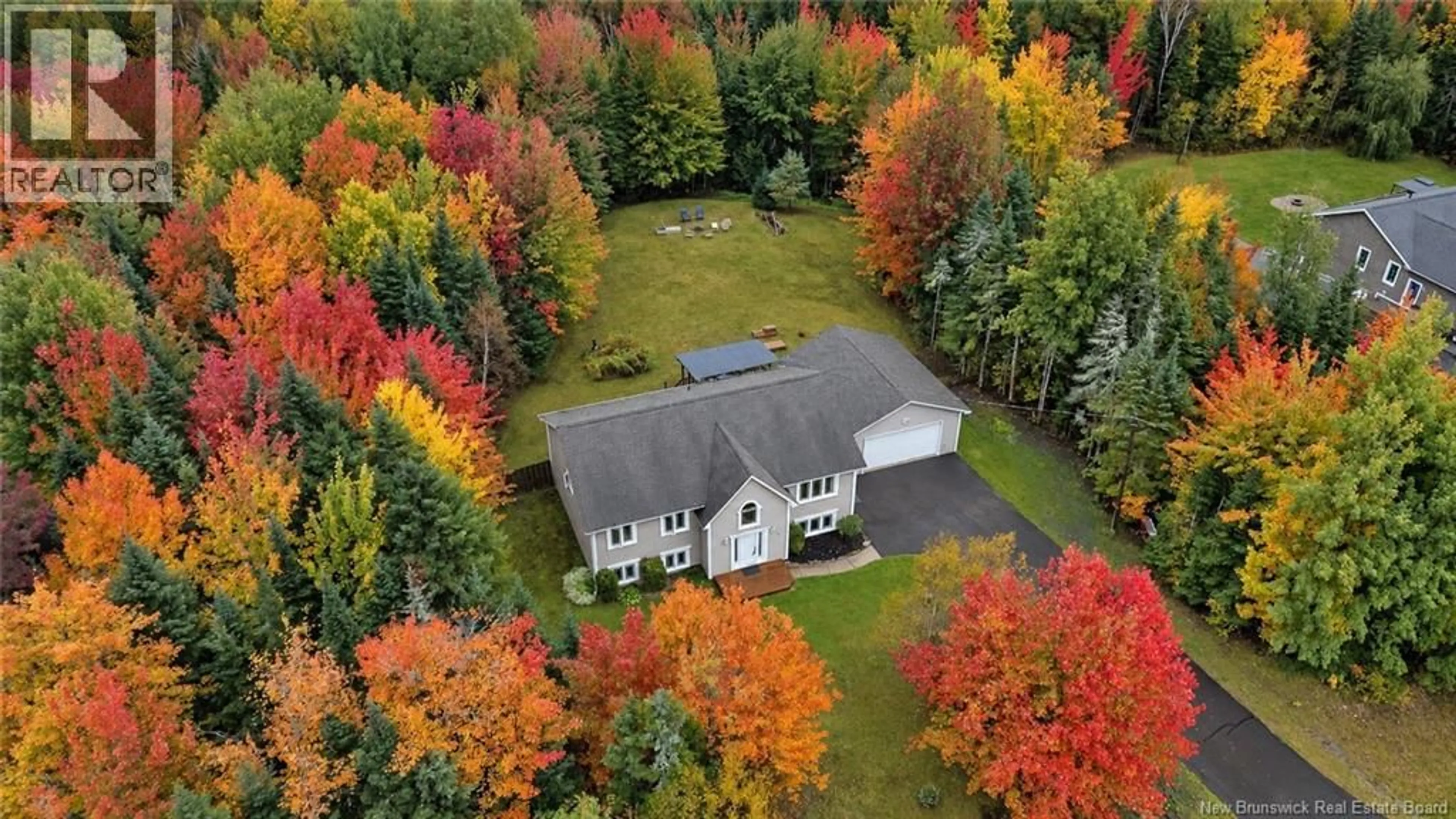A pic from outside/outdoor area/front of a property/back of a property/a pic from drone, forest/trees view for 69 WILDWOOD WAY, Burton New Brunswick E2V0G6
