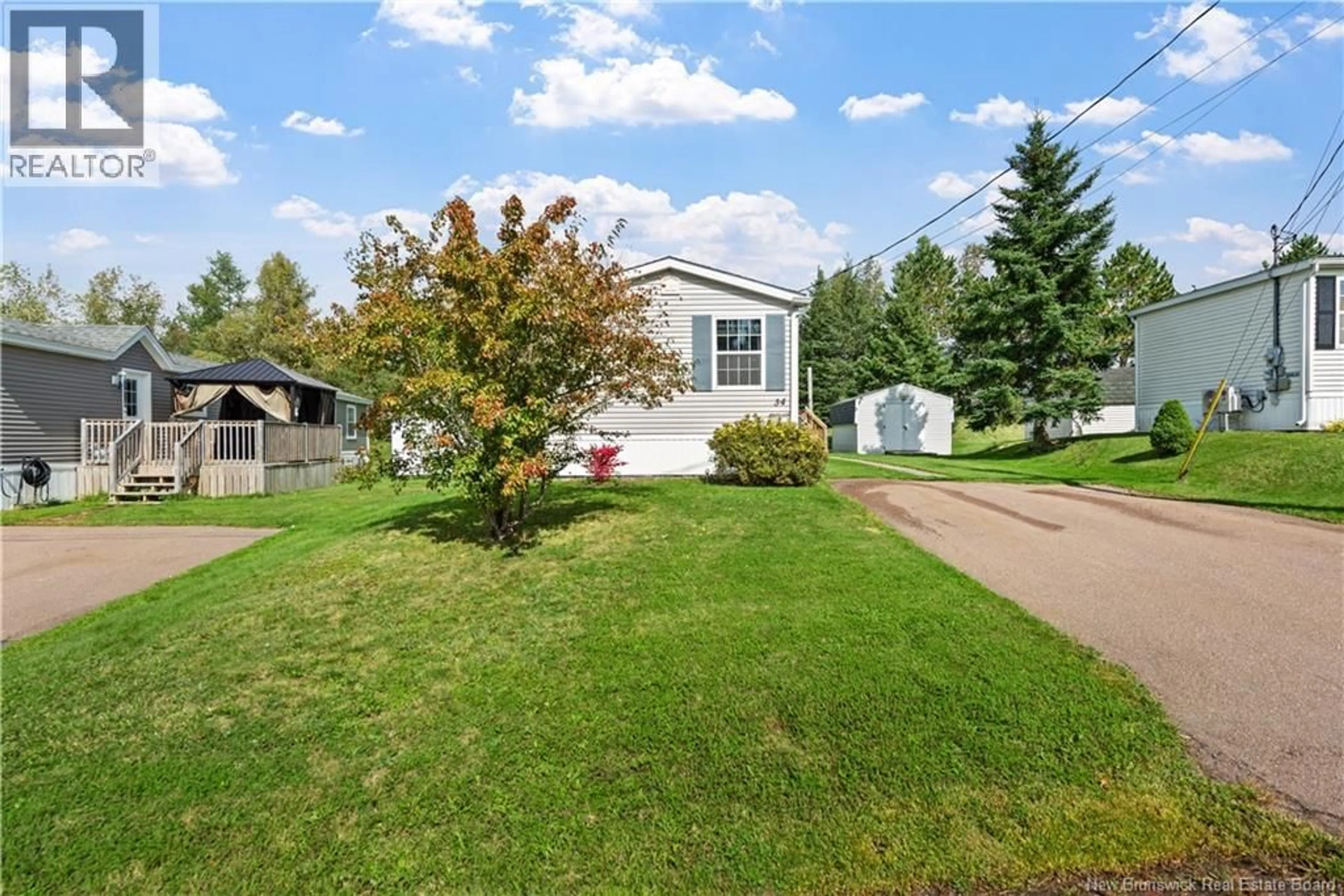 A pic from outside/outdoor area/front of a property/back of a property/a pic from drone, street for 34 ULYSSE DRIVE, Dieppe New Brunswick E1A7C1