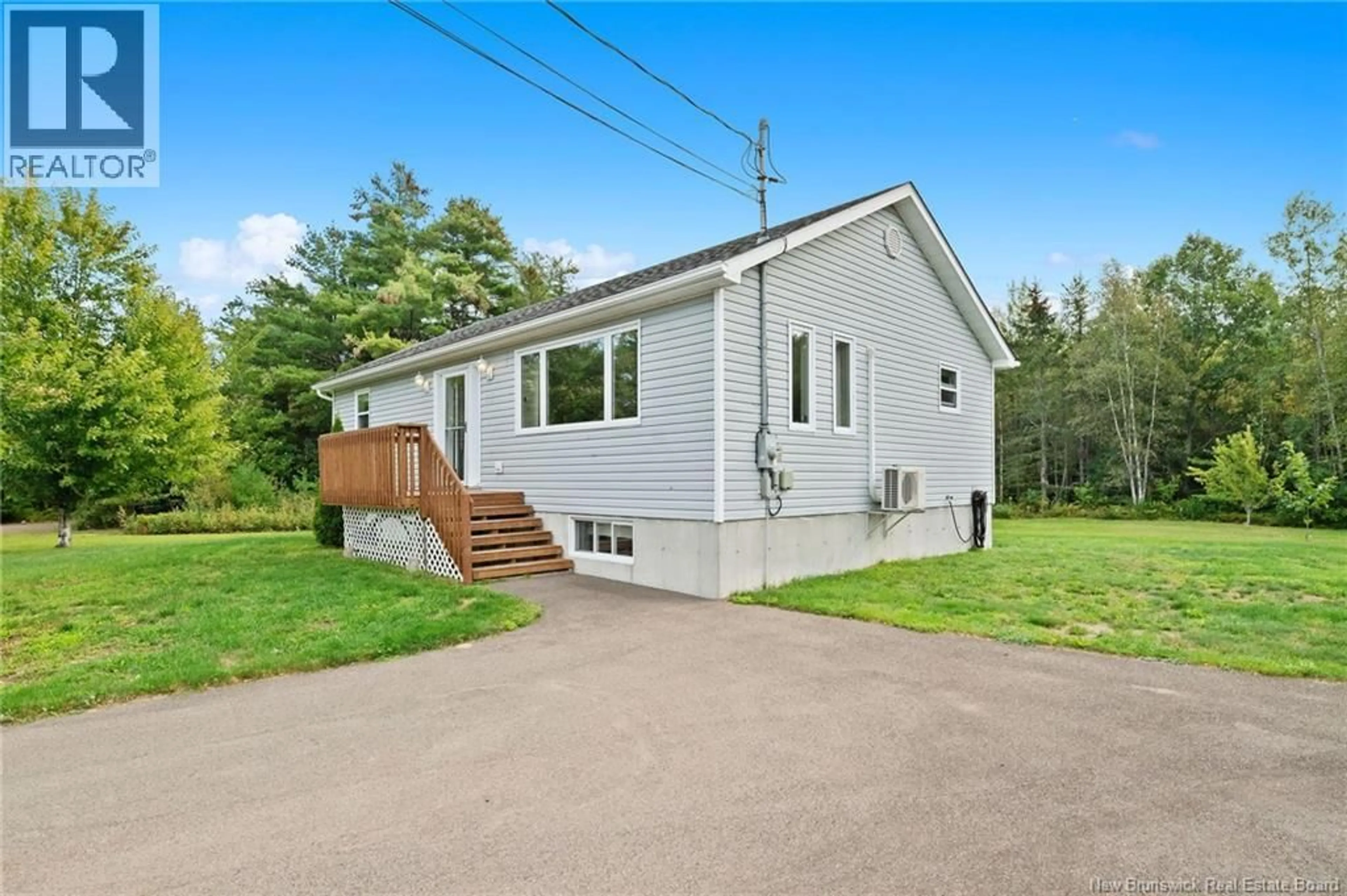 Home with vinyl exterior material, street for 22 CENTENNIAL, Richibucto New Brunswick E4W3X2