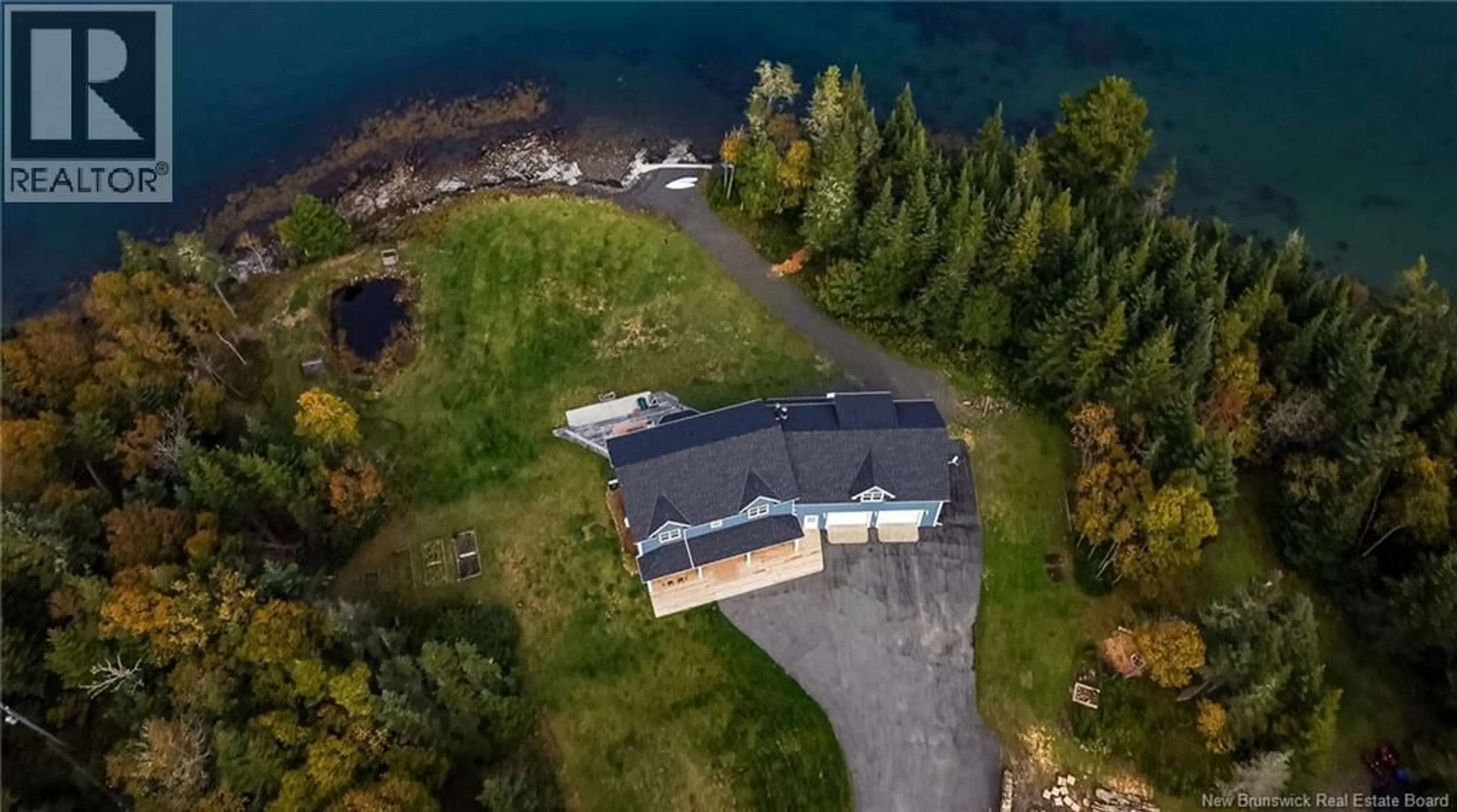 A pic from outside/outdoor area/front of a property/back of a property/a pic from drone, water/lake/river/ocean view for 181 MCCARTHY'S POINT ROAD, Pocologan New Brunswick E5J1A5