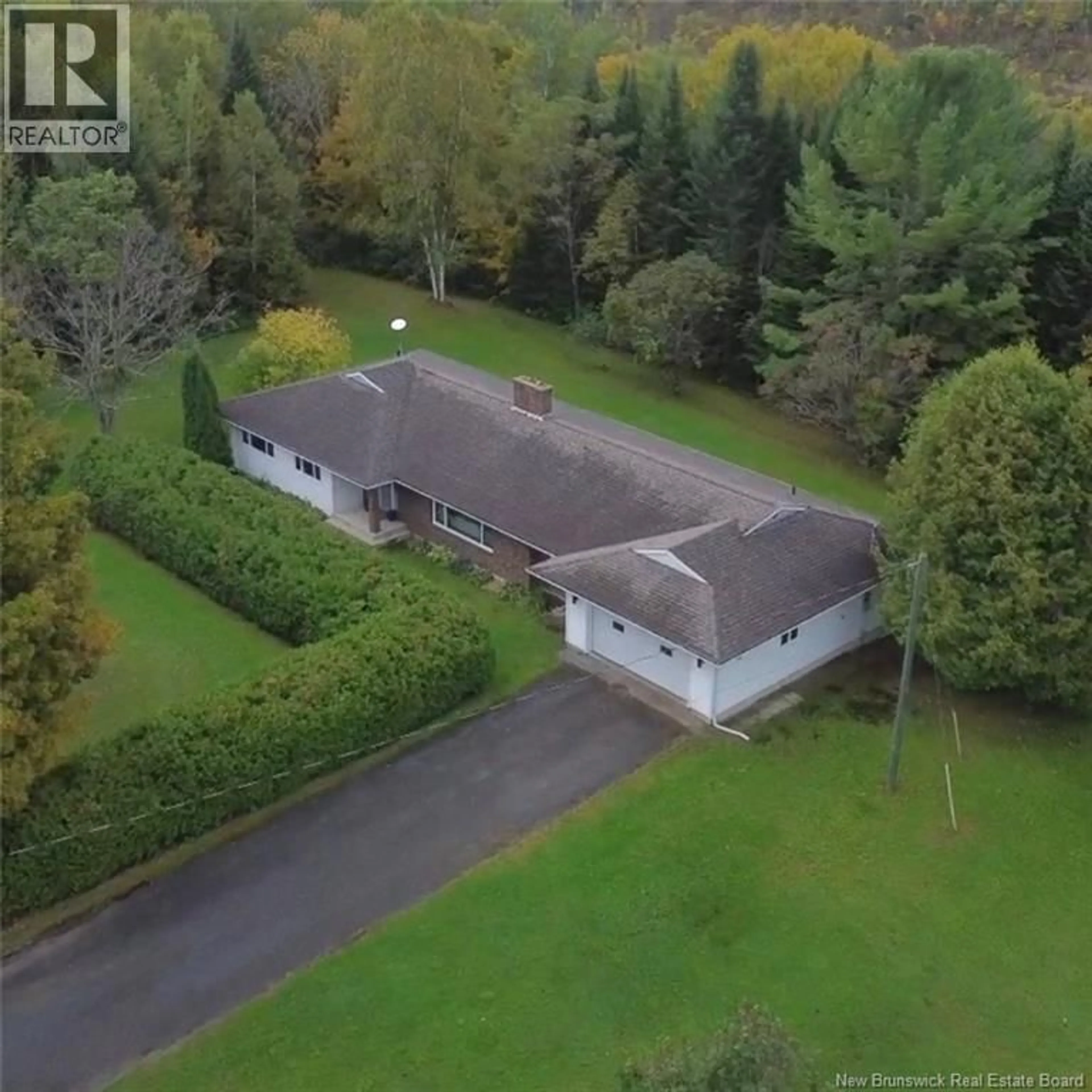 A pic from outside/outdoor area/front of a property/back of a property/a pic from drone, unknown for 10125 105 ROUTE ROUTE, Beechwood New Brunswick E7J2A5