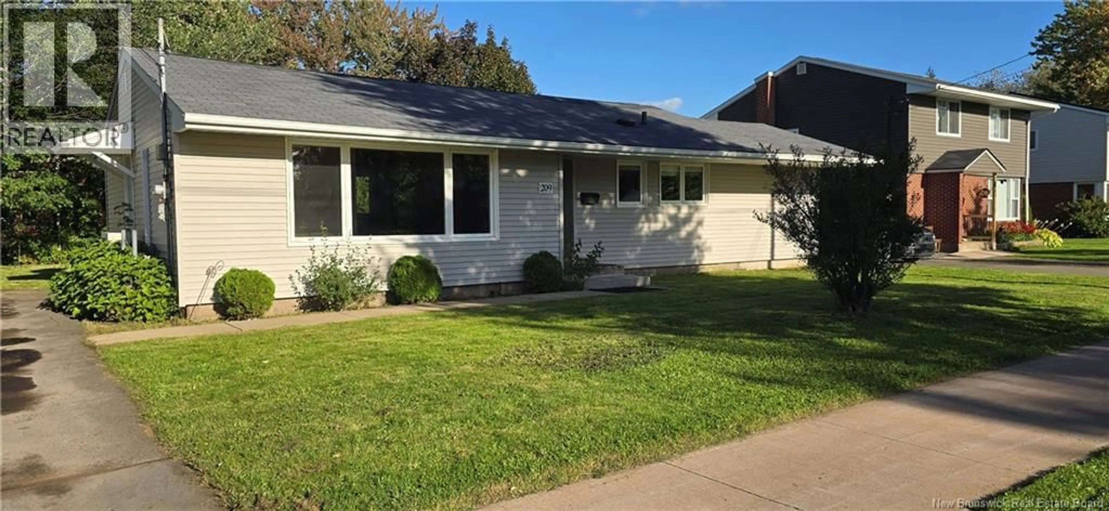 Home with vinyl exterior material, street for 209 DICKSON BOULEVARD, Moncton New Brunswick E1E2R2