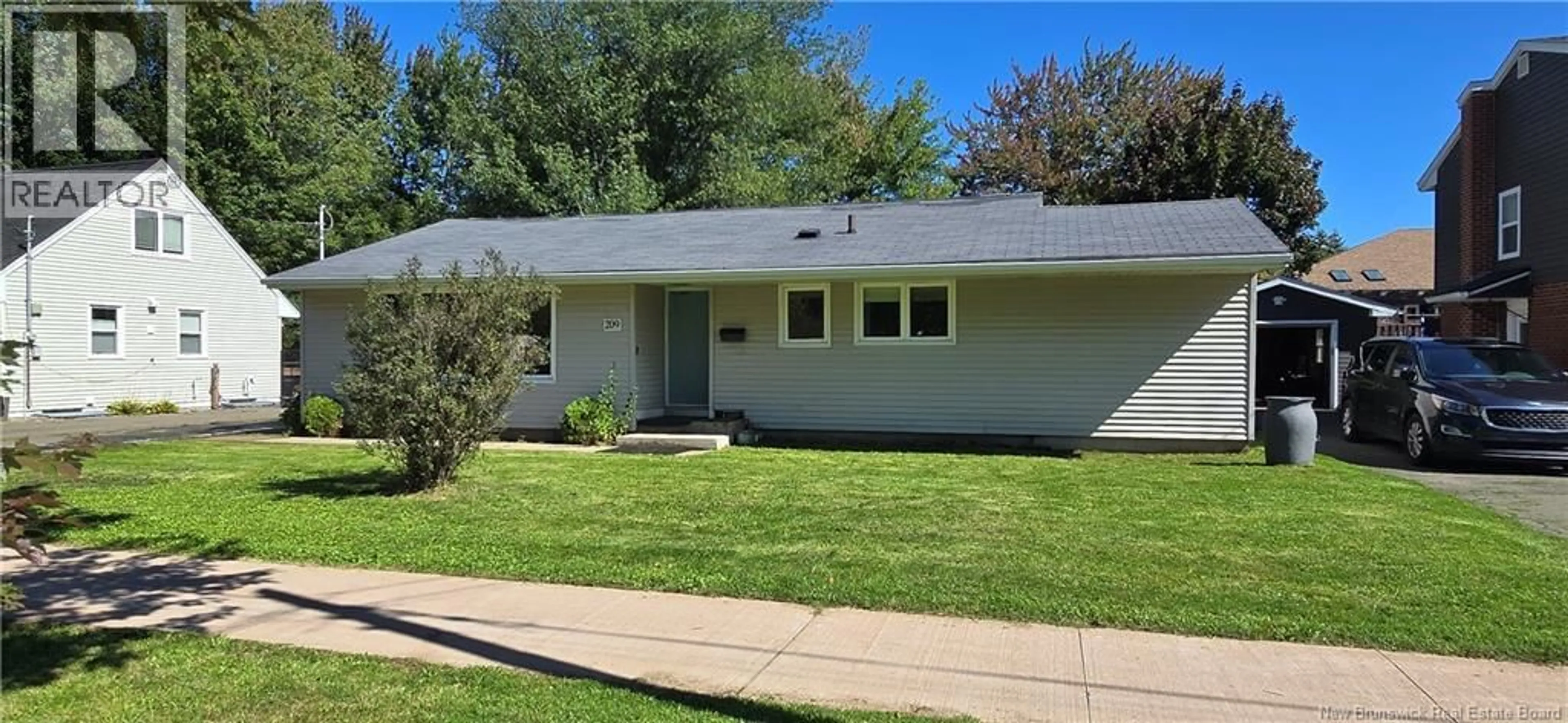 Home with vinyl exterior material, street for 209 DICKSON BOULEVARD, Moncton New Brunswick E1E2R2
