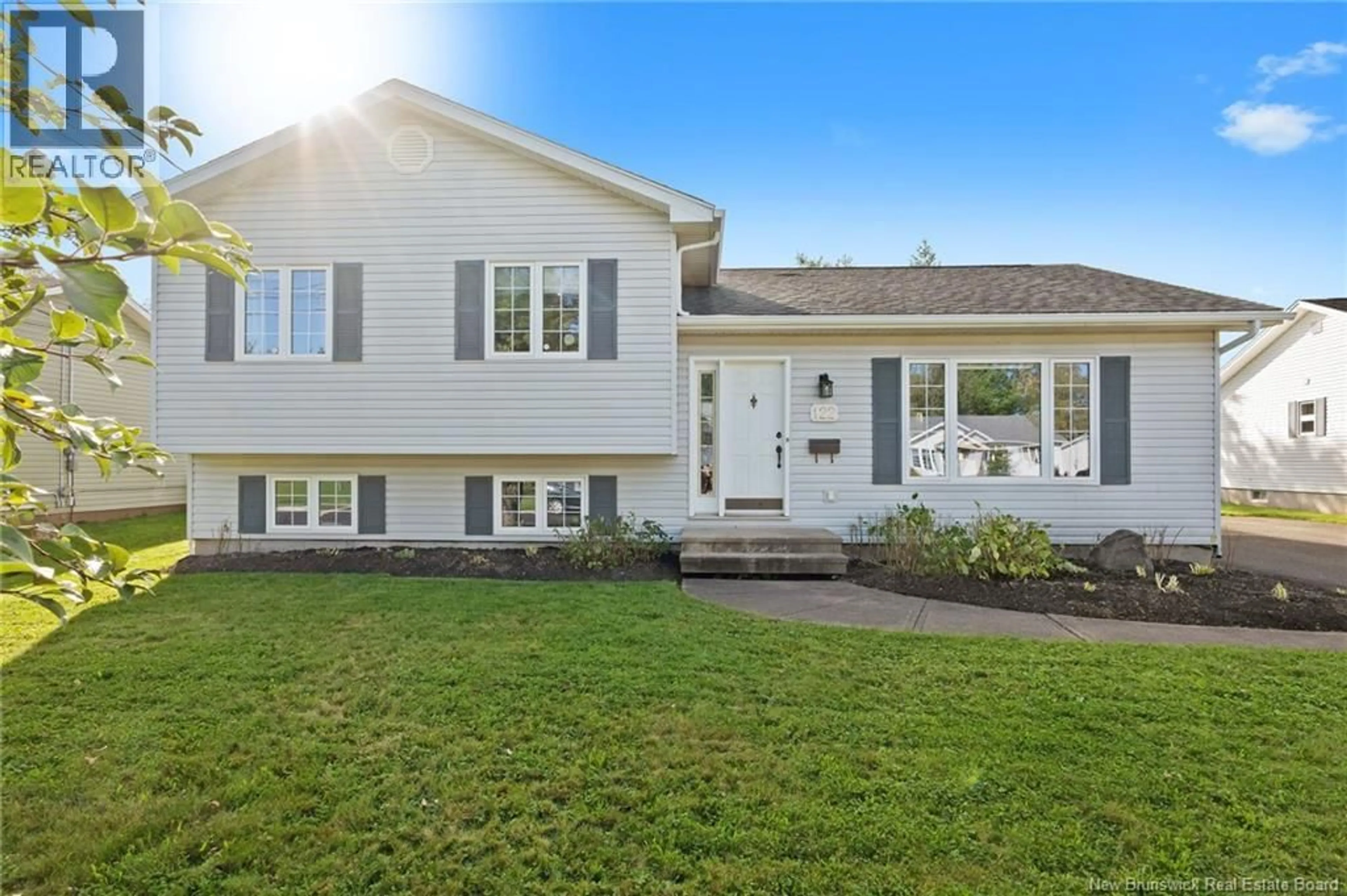 Home with vinyl exterior material, street for 122 DOLBEAU STREET, Dieppe New Brunswick E1A6V6