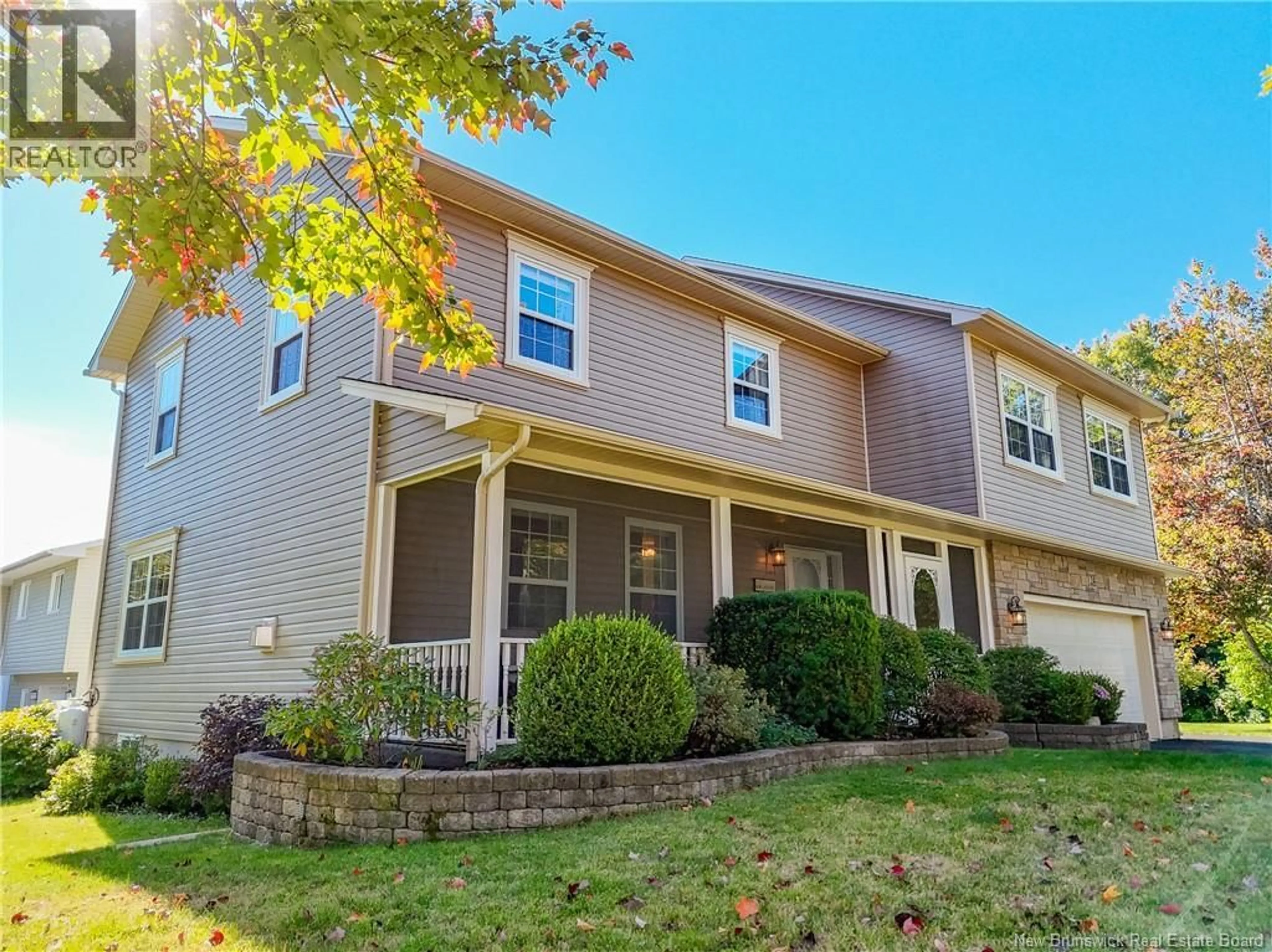 Home with vinyl exterior material, street for 24 WIGGINS DRIVE, Fredericton New Brunswick E3A5N6