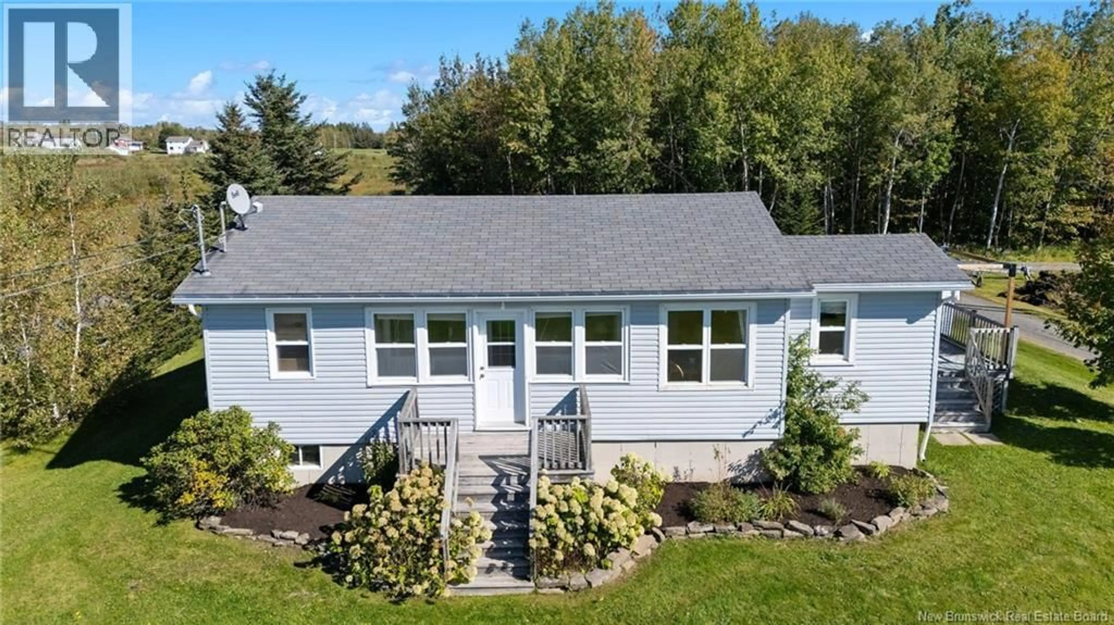 A pic from outside/outdoor area/front of a property/back of a property/a pic from drone, building for 92 SURETTE ROAD, Grande-Digue New Brunswick E4R5V5