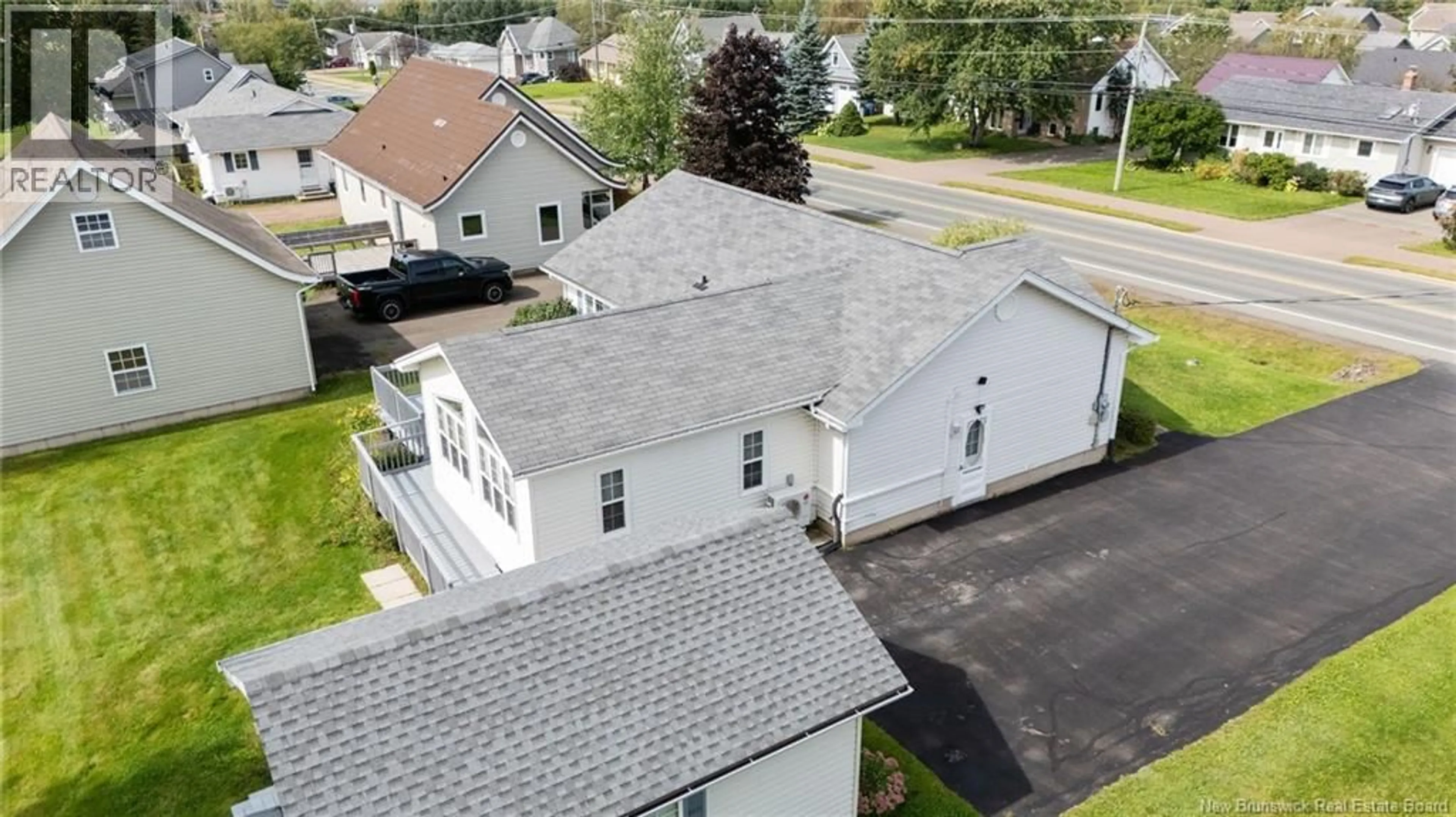 A pic from outside/outdoor area/front of a property/back of a property/a pic from drone, street for 941 MELANSON ROAD, Dieppe New Brunswick E1A7P1