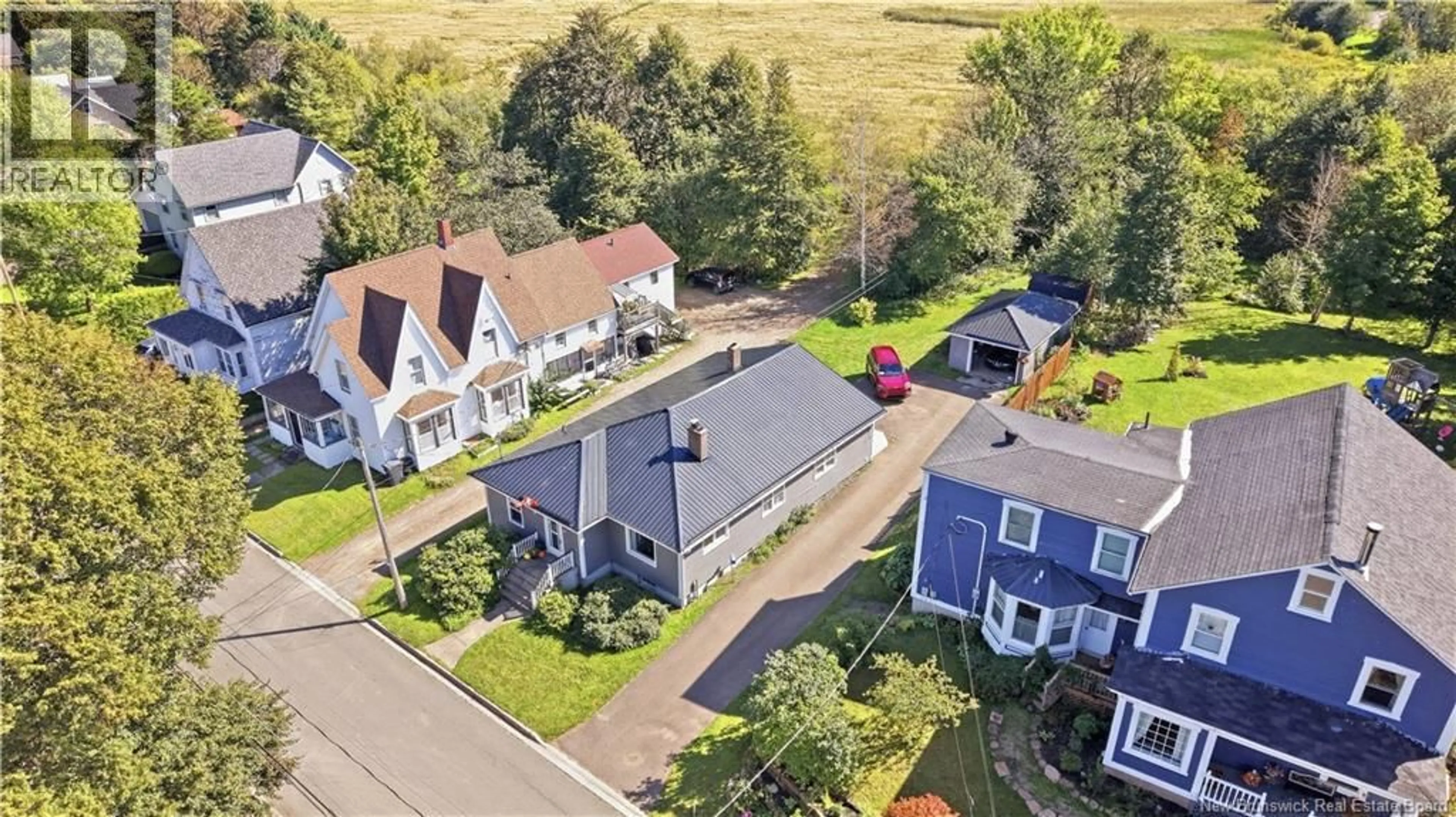 A pic from outside/outdoor area/front of a property/back of a property/a pic from drone, street for 13 SQUIRE STREET, Sackville New Brunswick E4L4K8