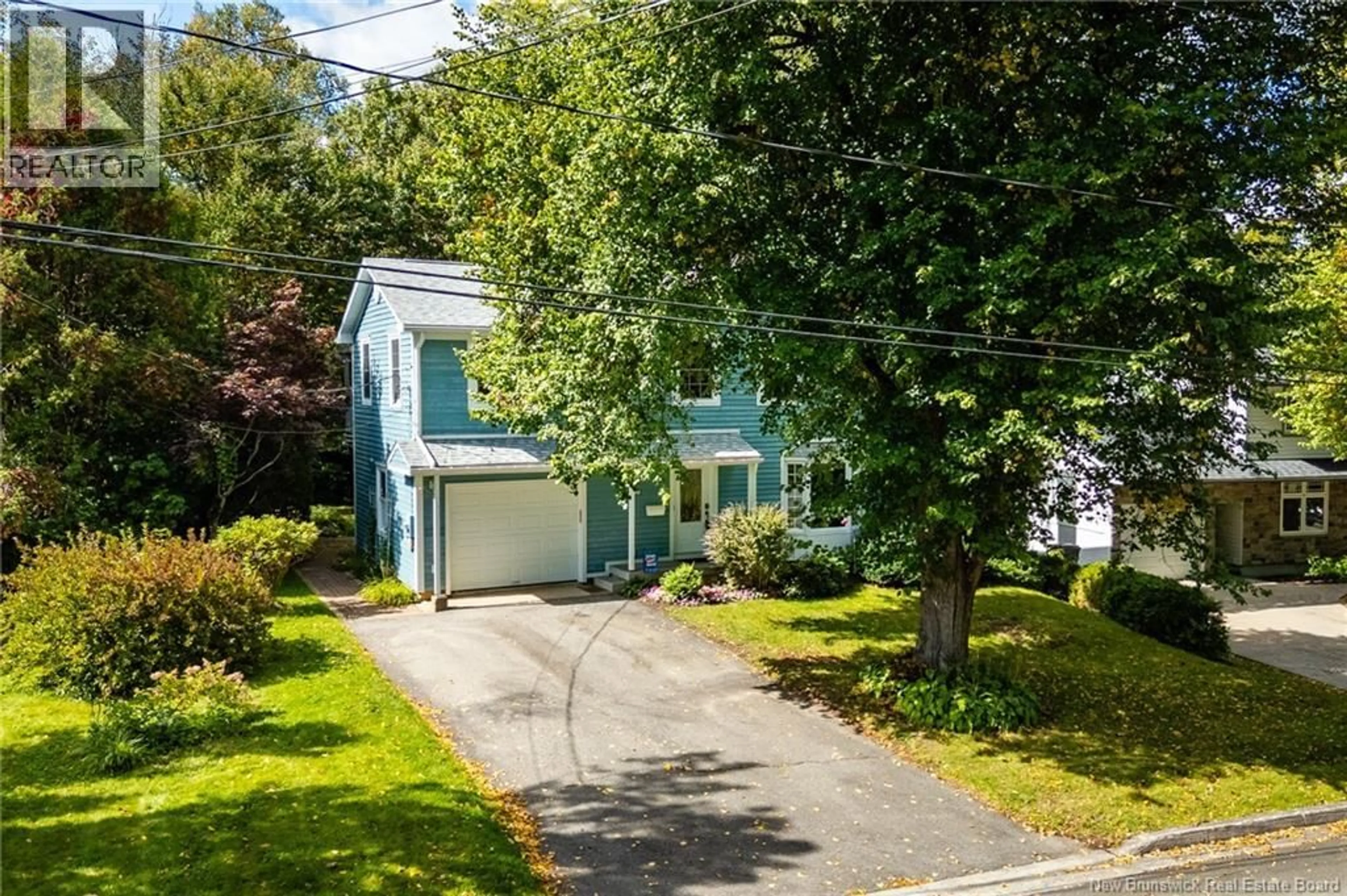 A pic from outside/outdoor area/front of a property/back of a property/a pic from drone, street for 560 SQUIRES STREET, Fredericton New Brunswick E3B3V4