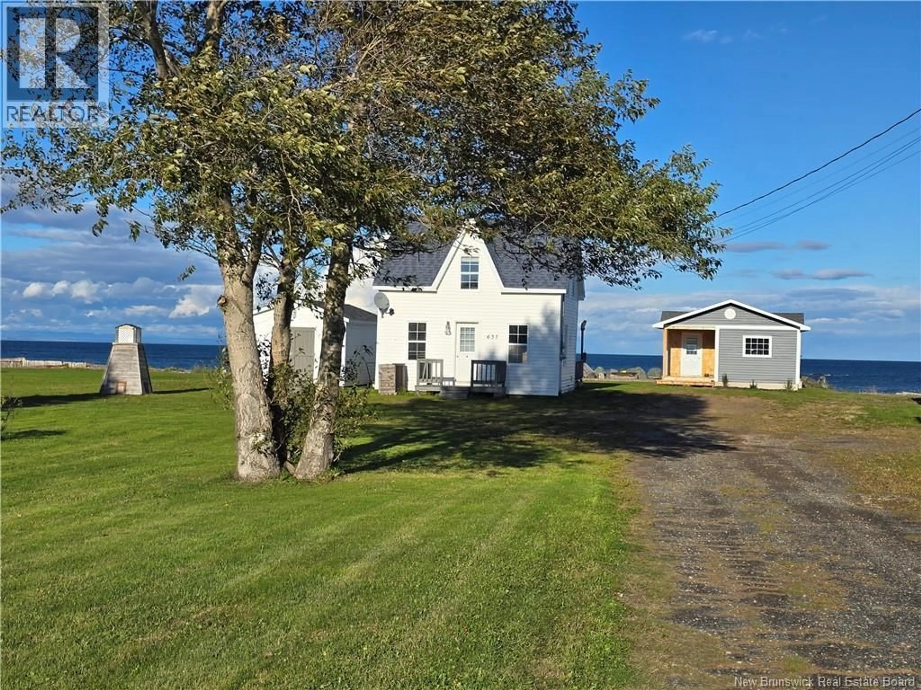 A pic from outside/outdoor area/front of a property/back of a property/a pic from drone, unknown for 637 PRINCIPALE, Pointe-Verte New Brunswick E8J2P8