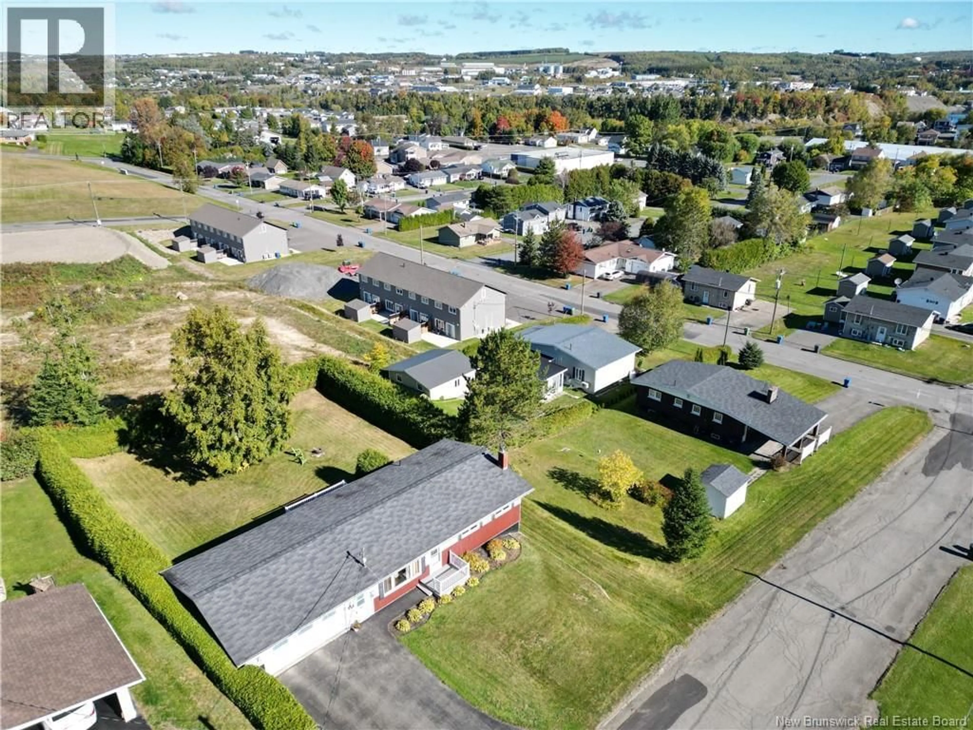 A pic from outside/outdoor area/front of a property/back of a property/a pic from drone, street for 612 DAVIS STREET, Grand Falls New Brunswick E3Z1B3