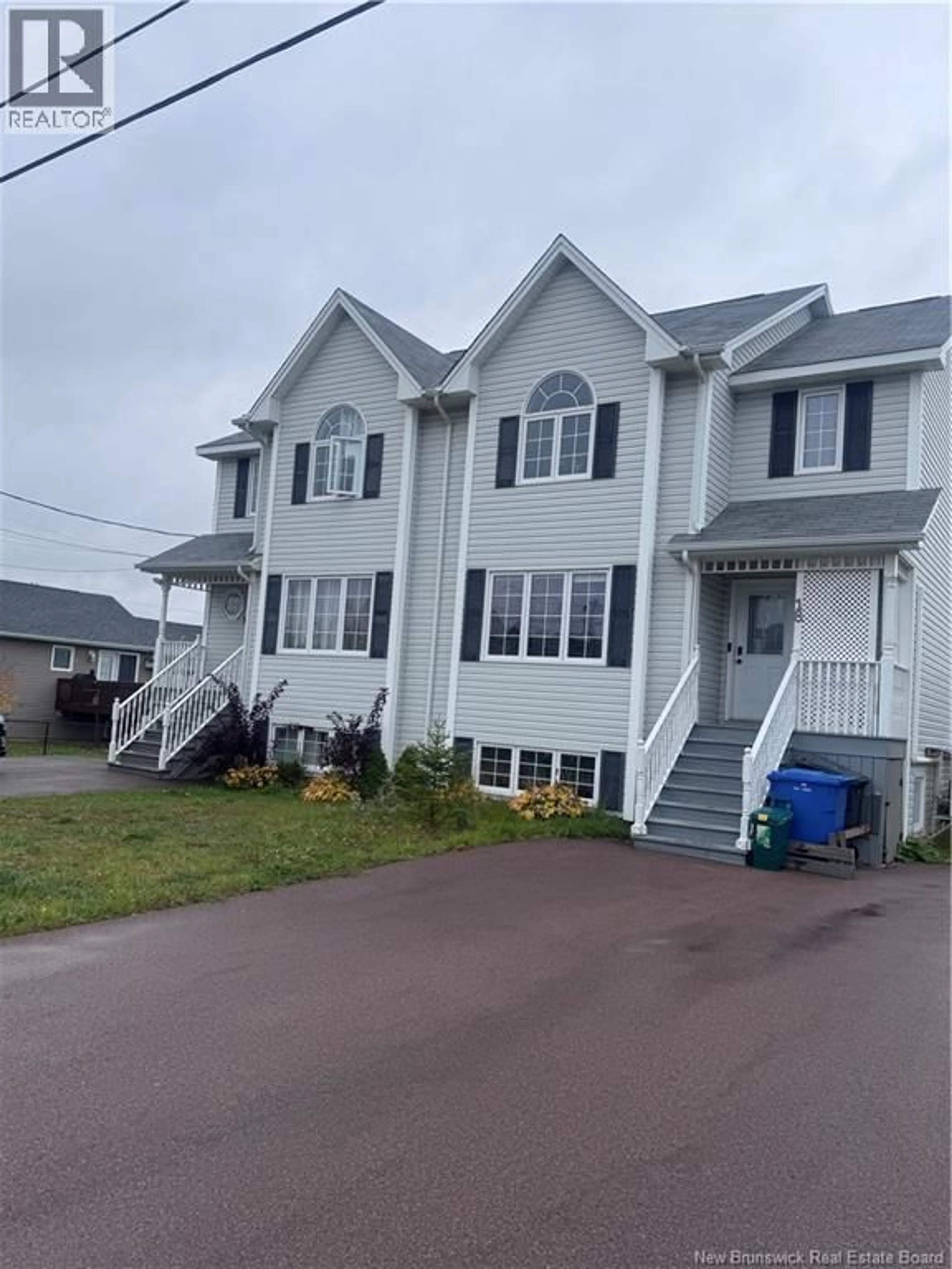Home with vinyl exterior material, street for 18 RAINFORD COURT, Moncton New Brunswick E1G0T4