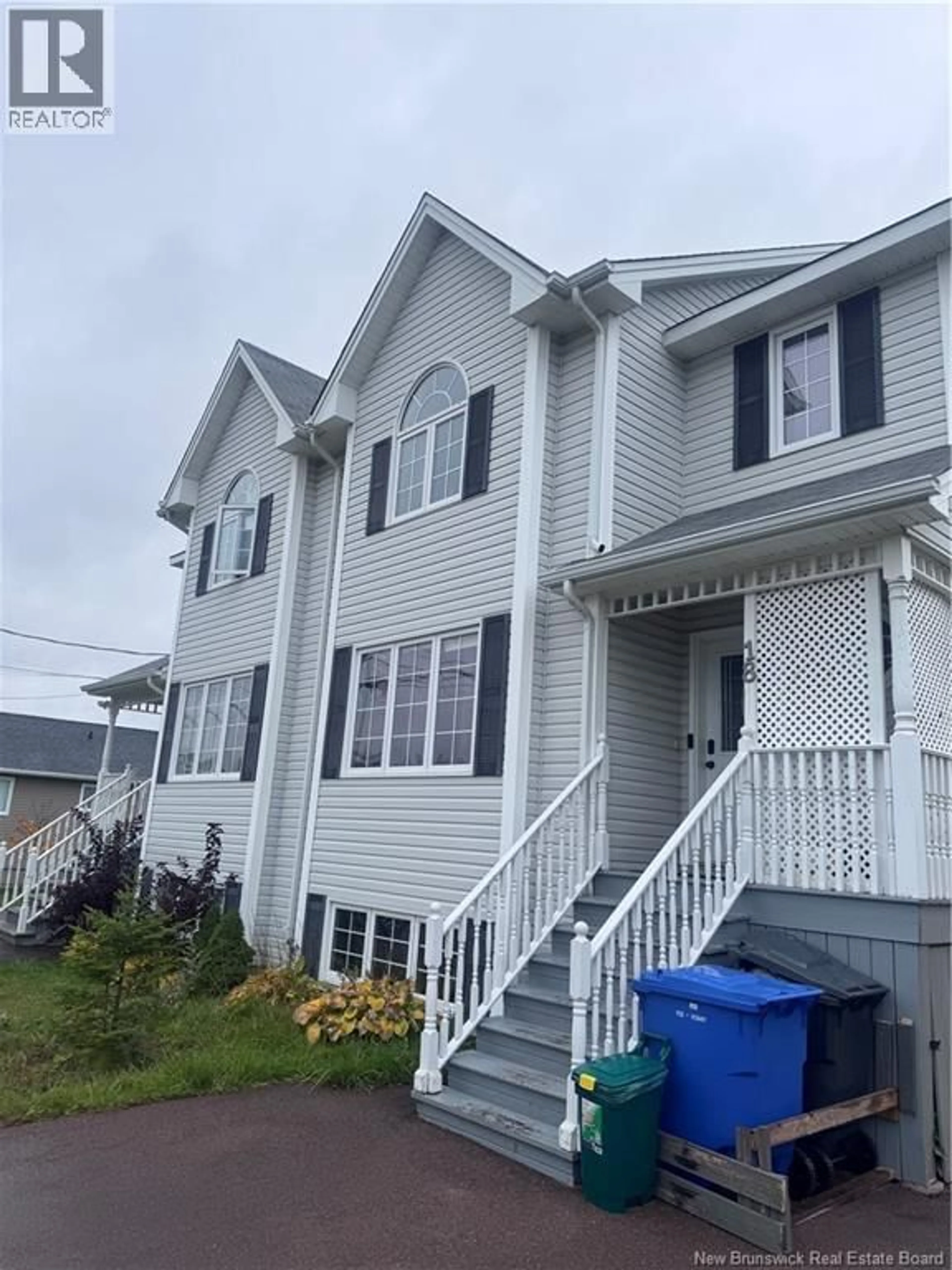 Home with vinyl exterior material, street for 18 RAINFORD COURT, Moncton New Brunswick E1G0T4