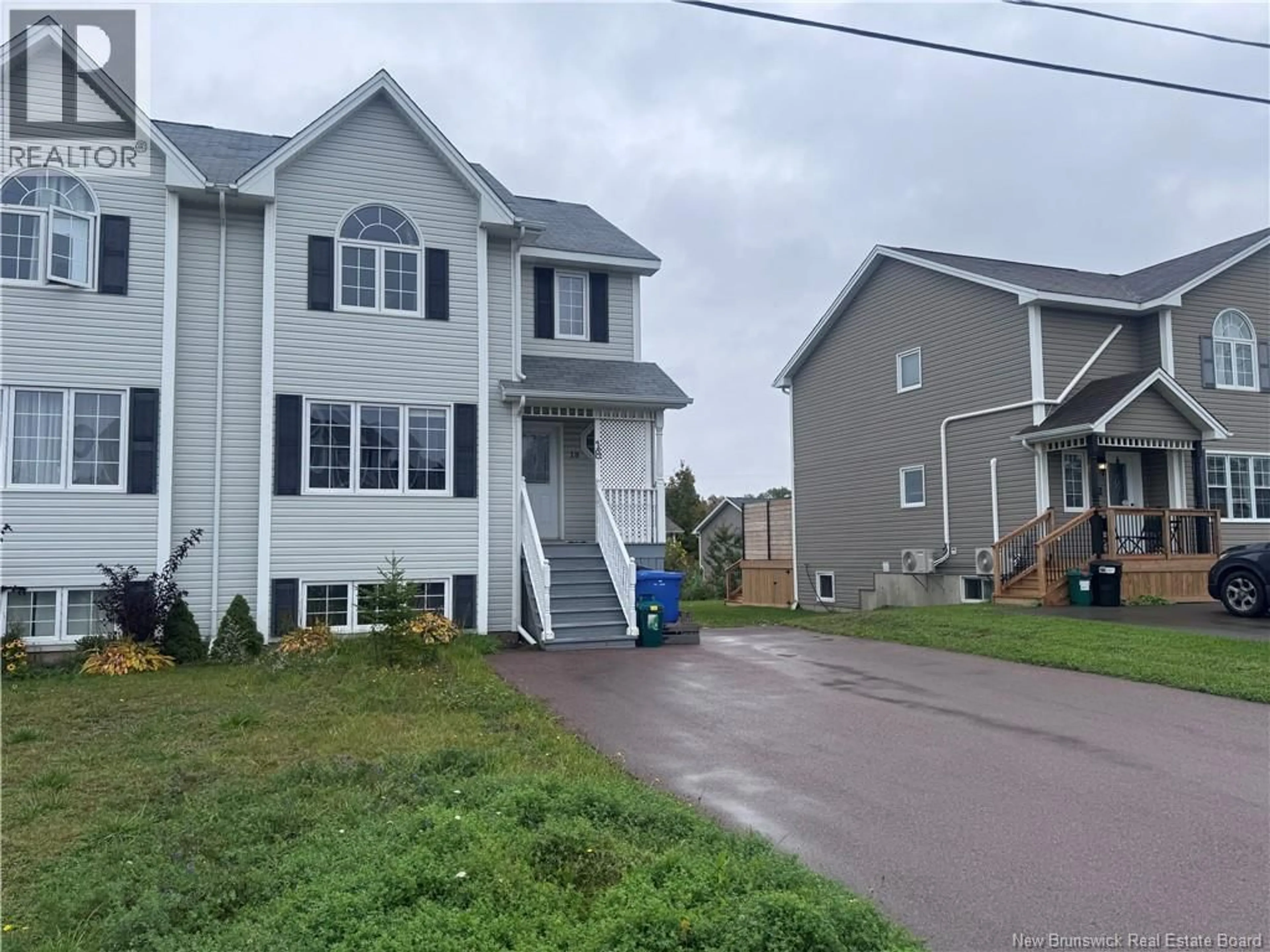Home with vinyl exterior material, street for 18 RAINFORD COURT, Moncton New Brunswick E1G0T4