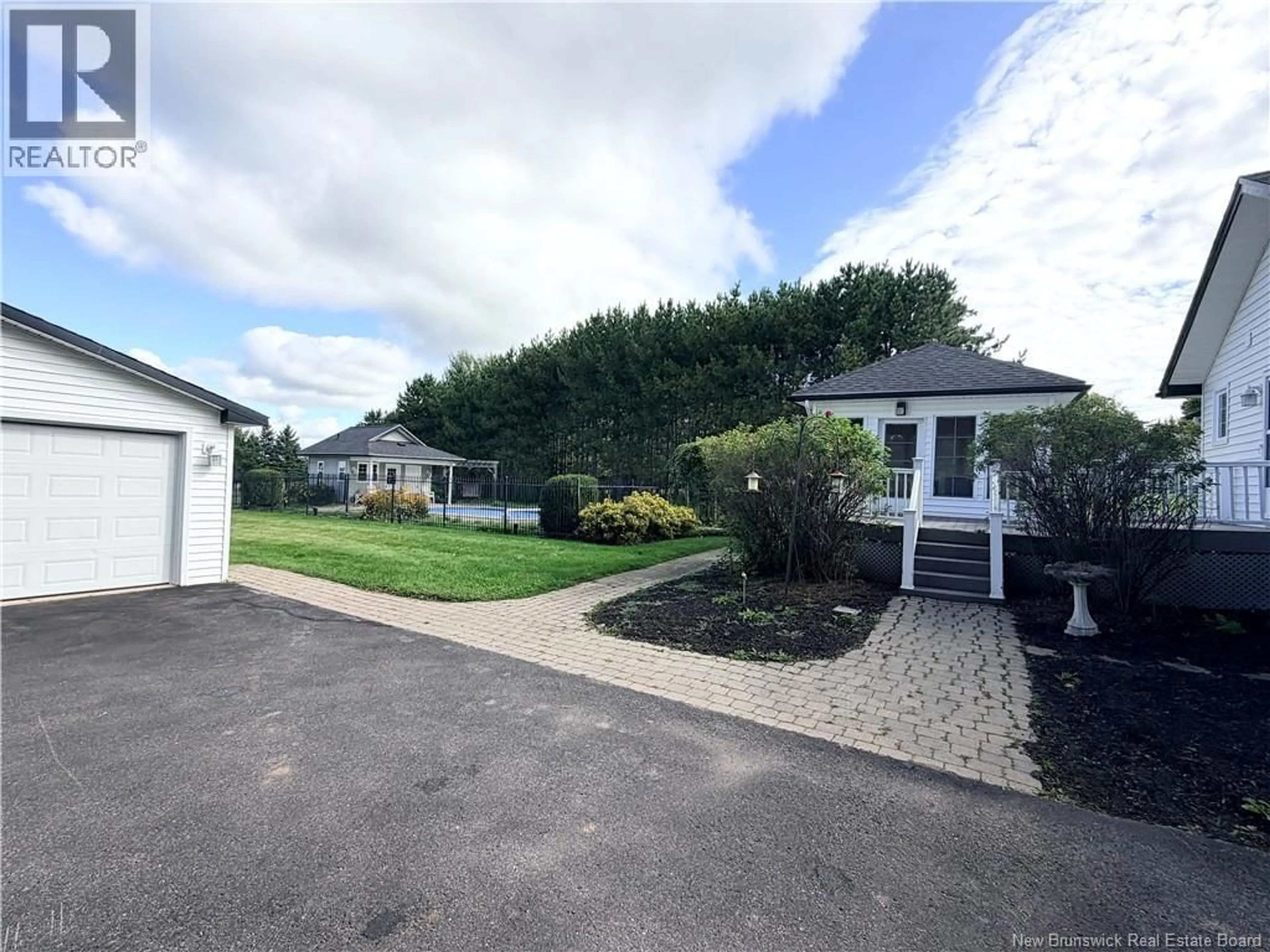 A pic from outside/outdoor area/front of a property/back of a property/a pic from drone, street for 12 MEREDITH DRIVE, Sussex Corner New Brunswick E4E2T7