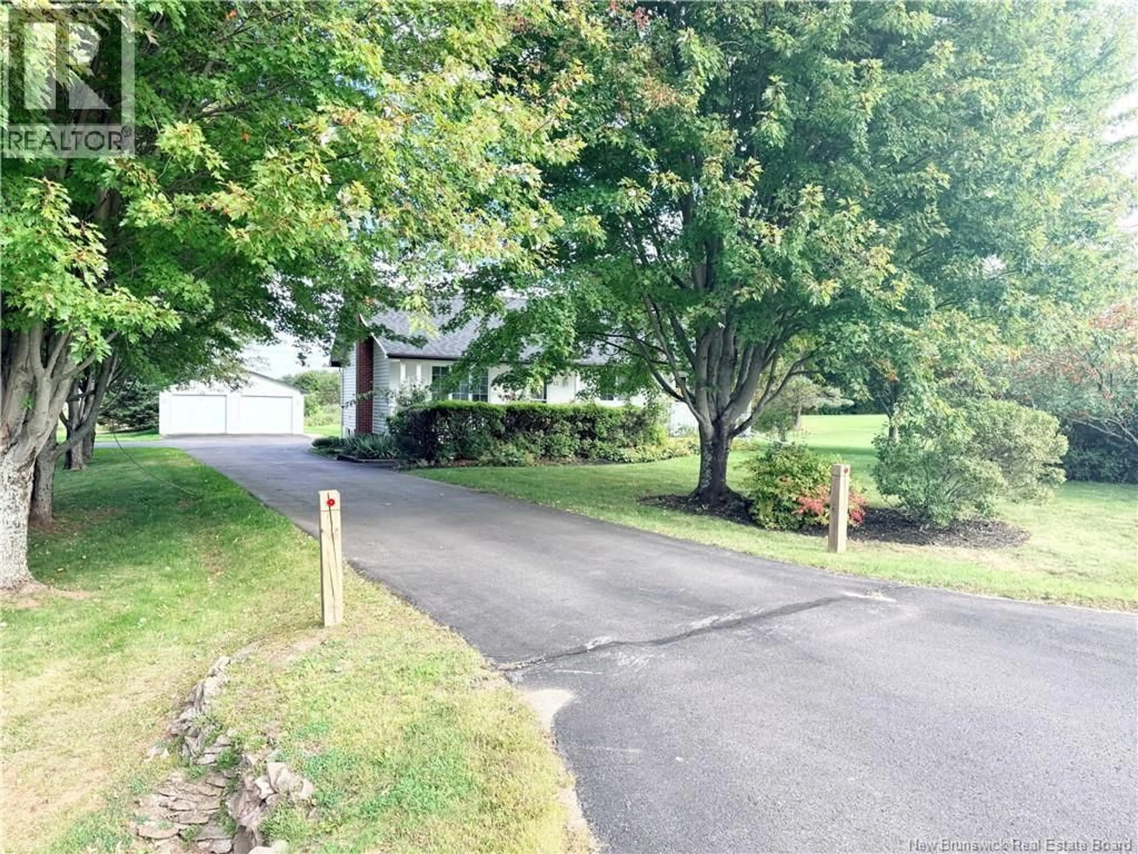 A pic from outside/outdoor area/front of a property/back of a property/a pic from drone, street for 12 MEREDITH DRIVE, Sussex Corner New Brunswick E4E2T7