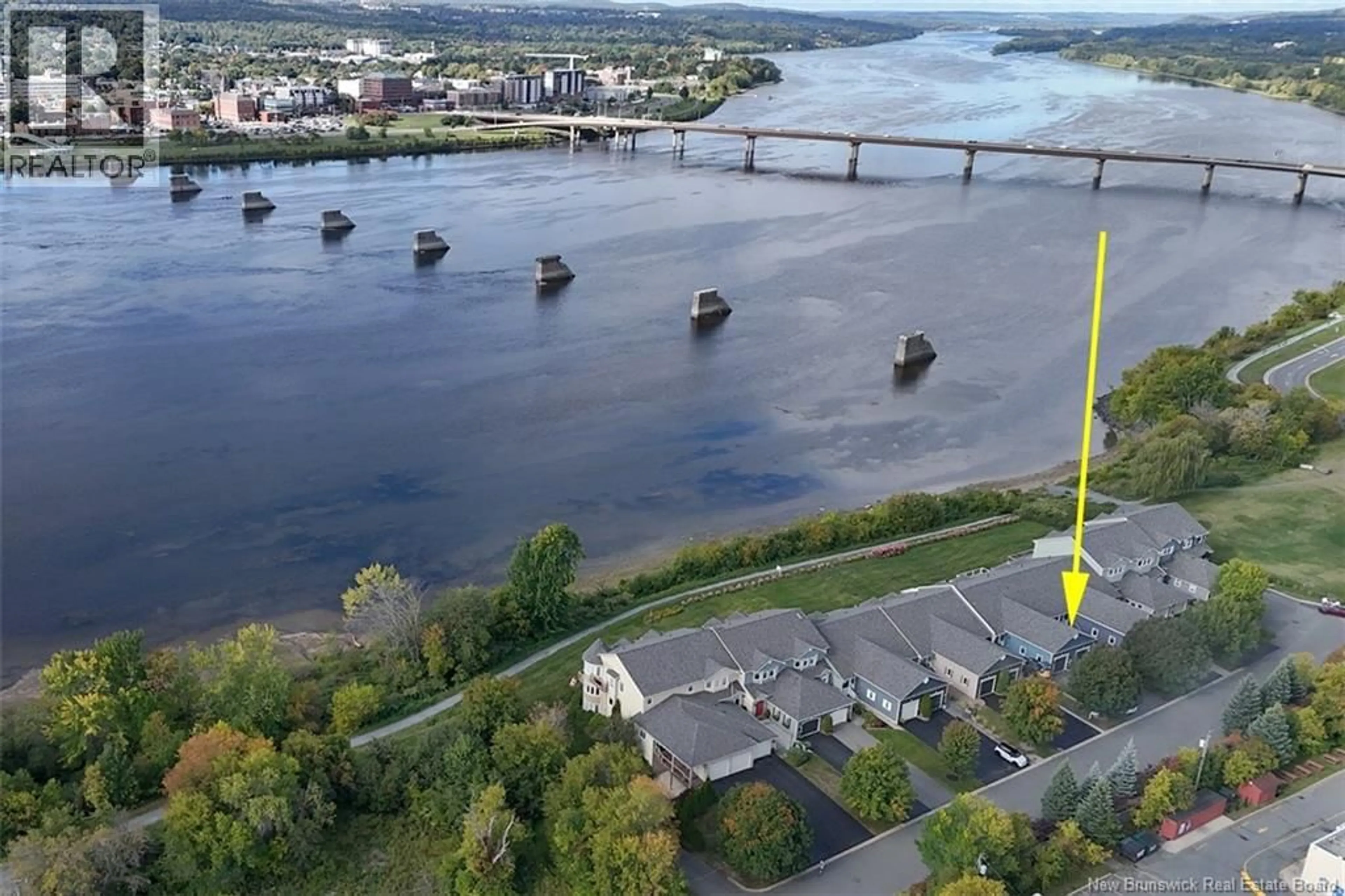 A pic from outside/outdoor area/front of a property/back of a property/a pic from drone, water/lake/river/ocean view for 56 WATERFORD LANE, Fredericton New Brunswick E3A0E2