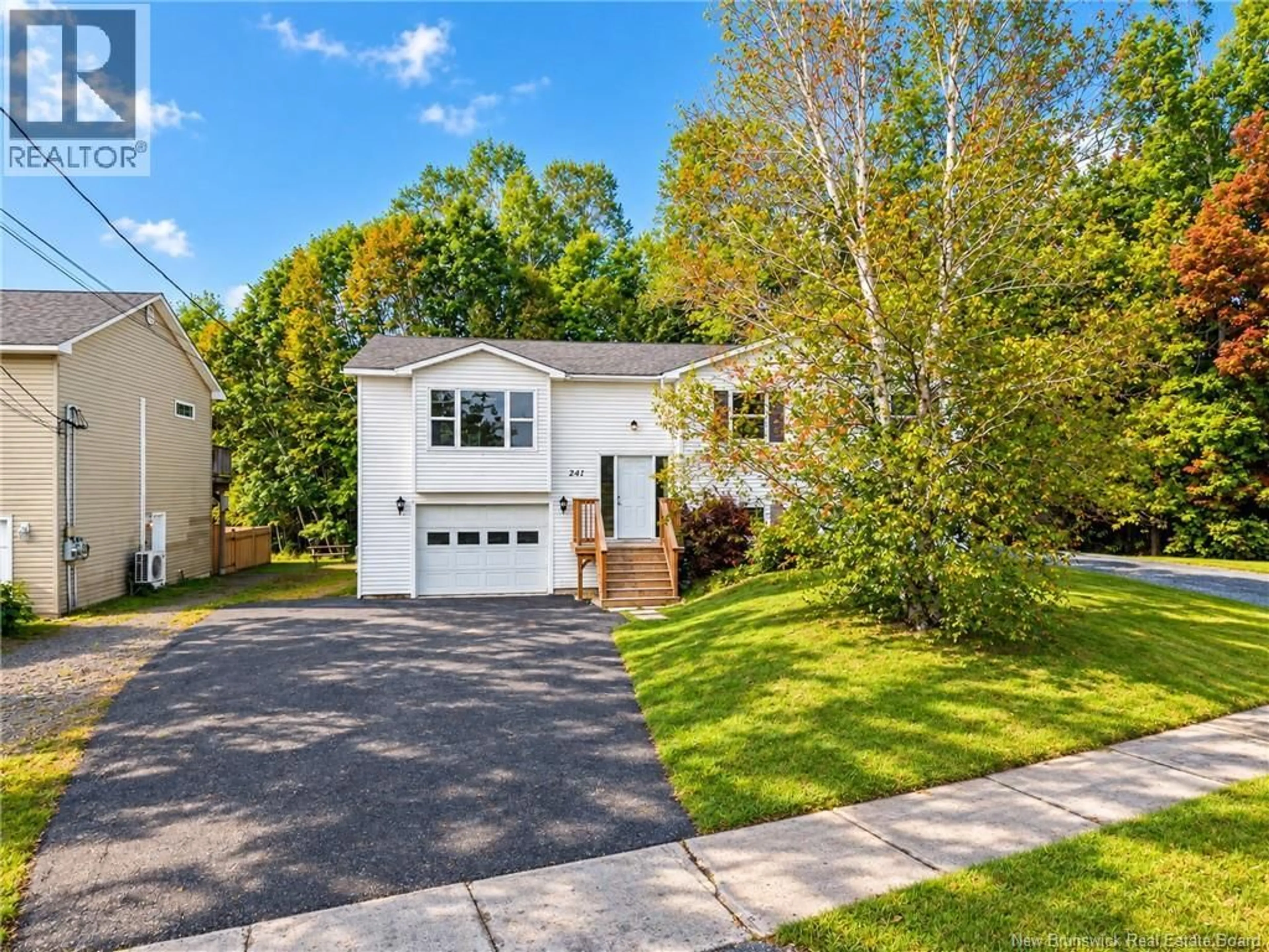 Home with vinyl exterior material, street for 241 CLAUDIE ROAD, Fredericton New Brunswick E3G7T6
