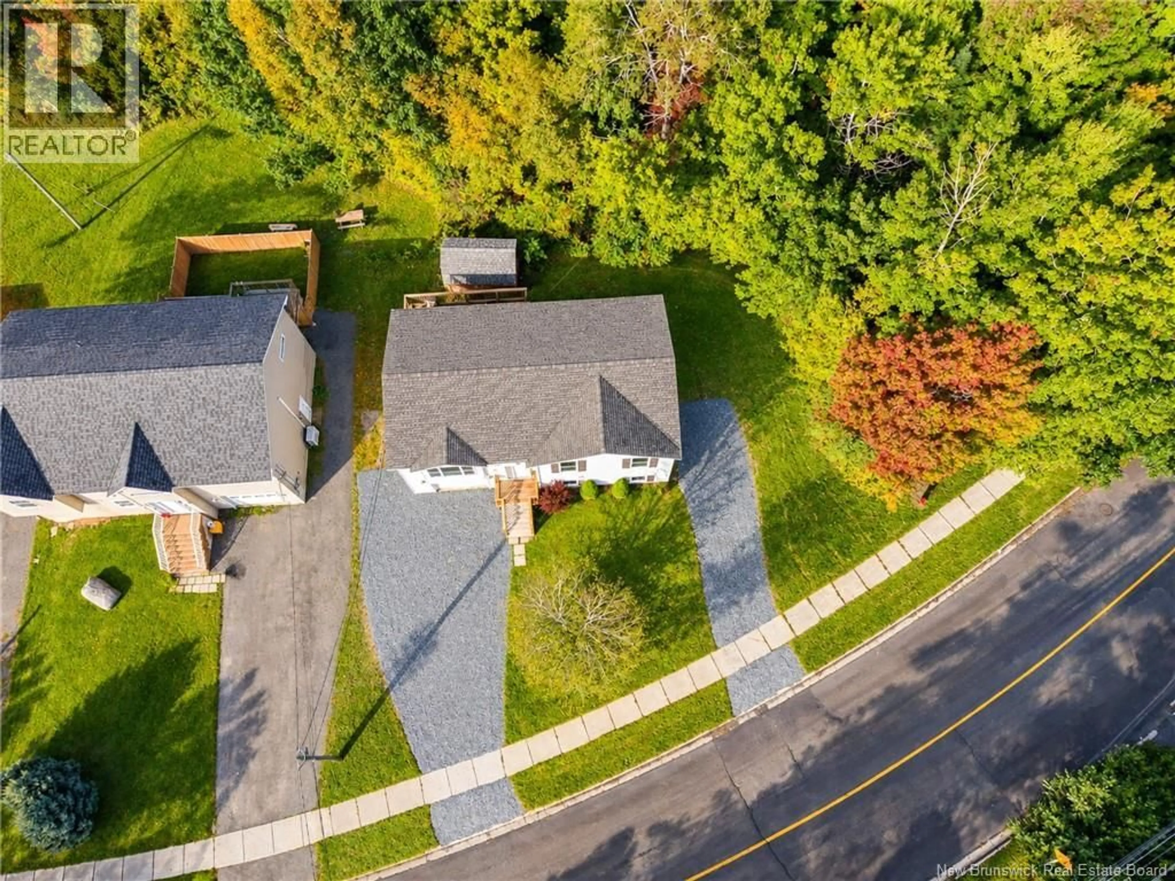 A pic from outside/outdoor area/front of a property/back of a property/a pic from drone, street for 241 CLAUDIE ROAD, Fredericton New Brunswick E3G7T6