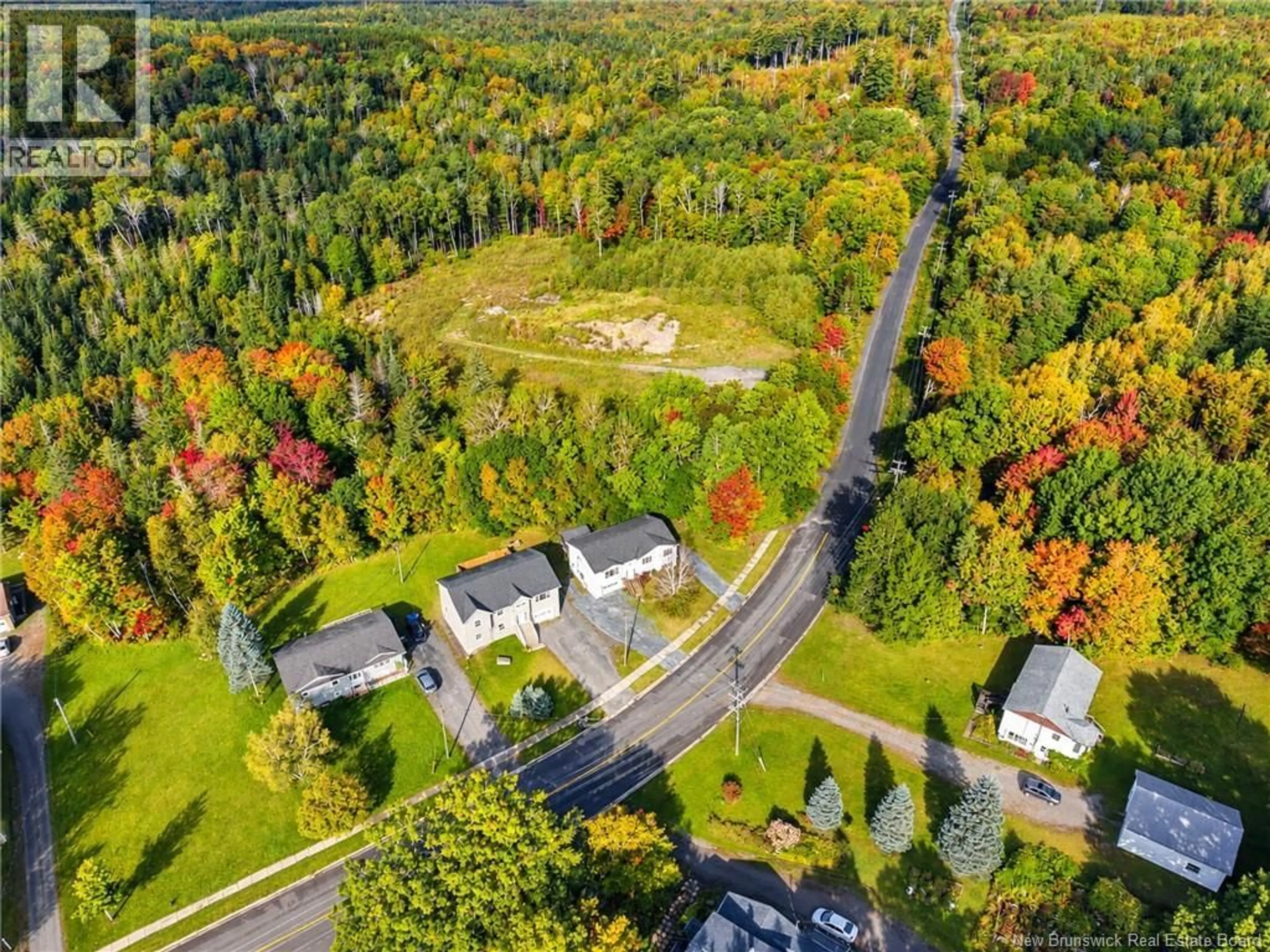 A pic from outside/outdoor area/front of a property/back of a property/a pic from drone, unknown for 241 CLAUDIE ROAD, Fredericton New Brunswick E3G7T6