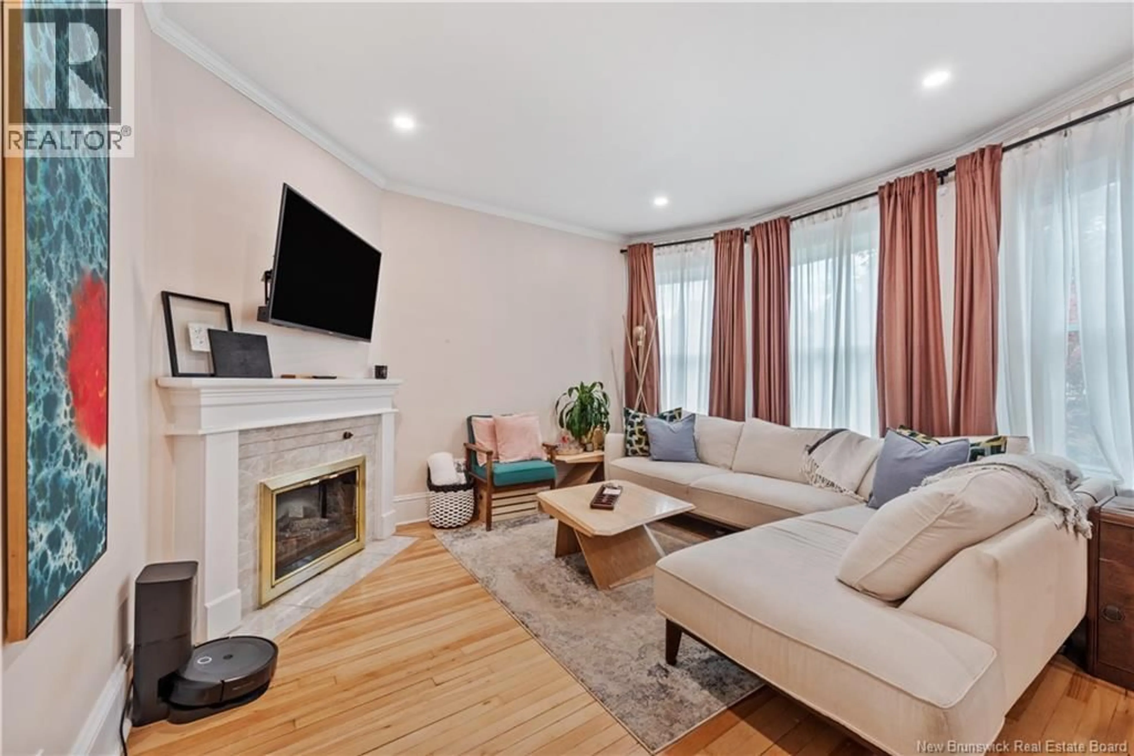 Living room with furniture, wood/laminate floor for 333 CAMERON STREET, Moncton New Brunswick E1C5Z5