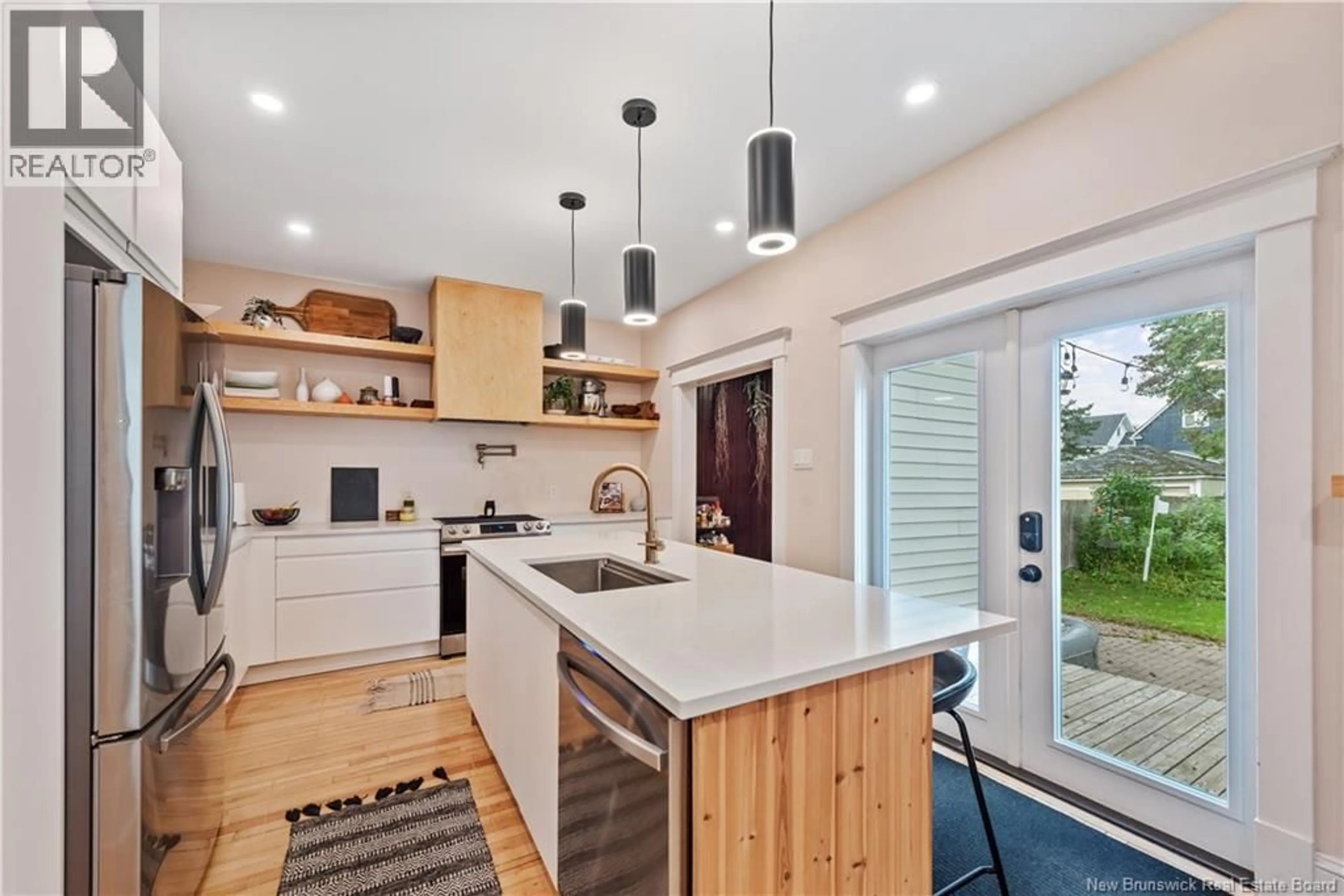 Open concept kitchen, wood/laminate floor for 333 CAMERON STREET, Moncton New Brunswick E1C5Z5
