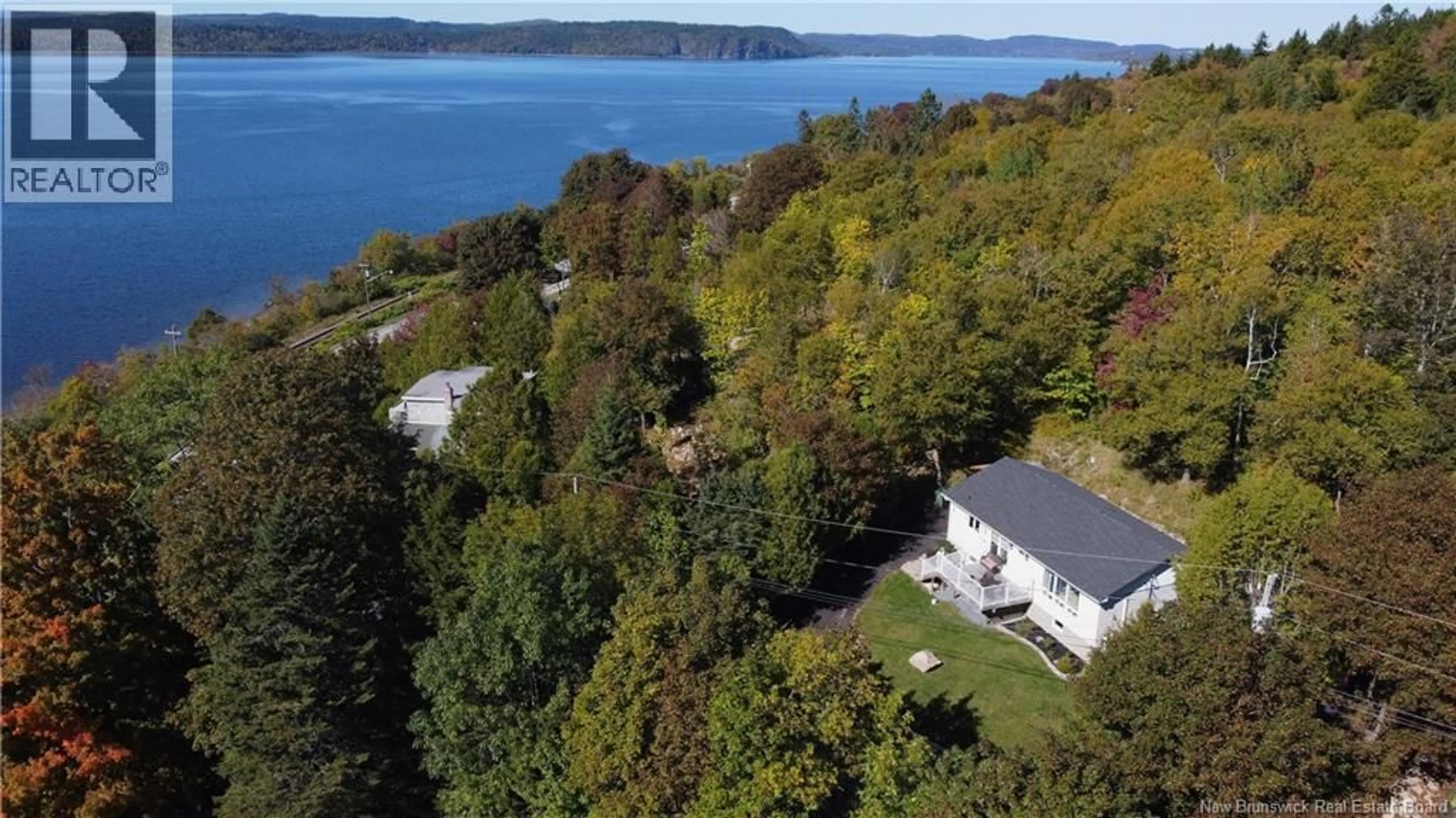A pic from outside/outdoor area/front of a property/back of a property/a pic from drone, water/lake/river/ocean view for 15 HAZEN AVENUE, Rothesay New Brunswick E2H1N9