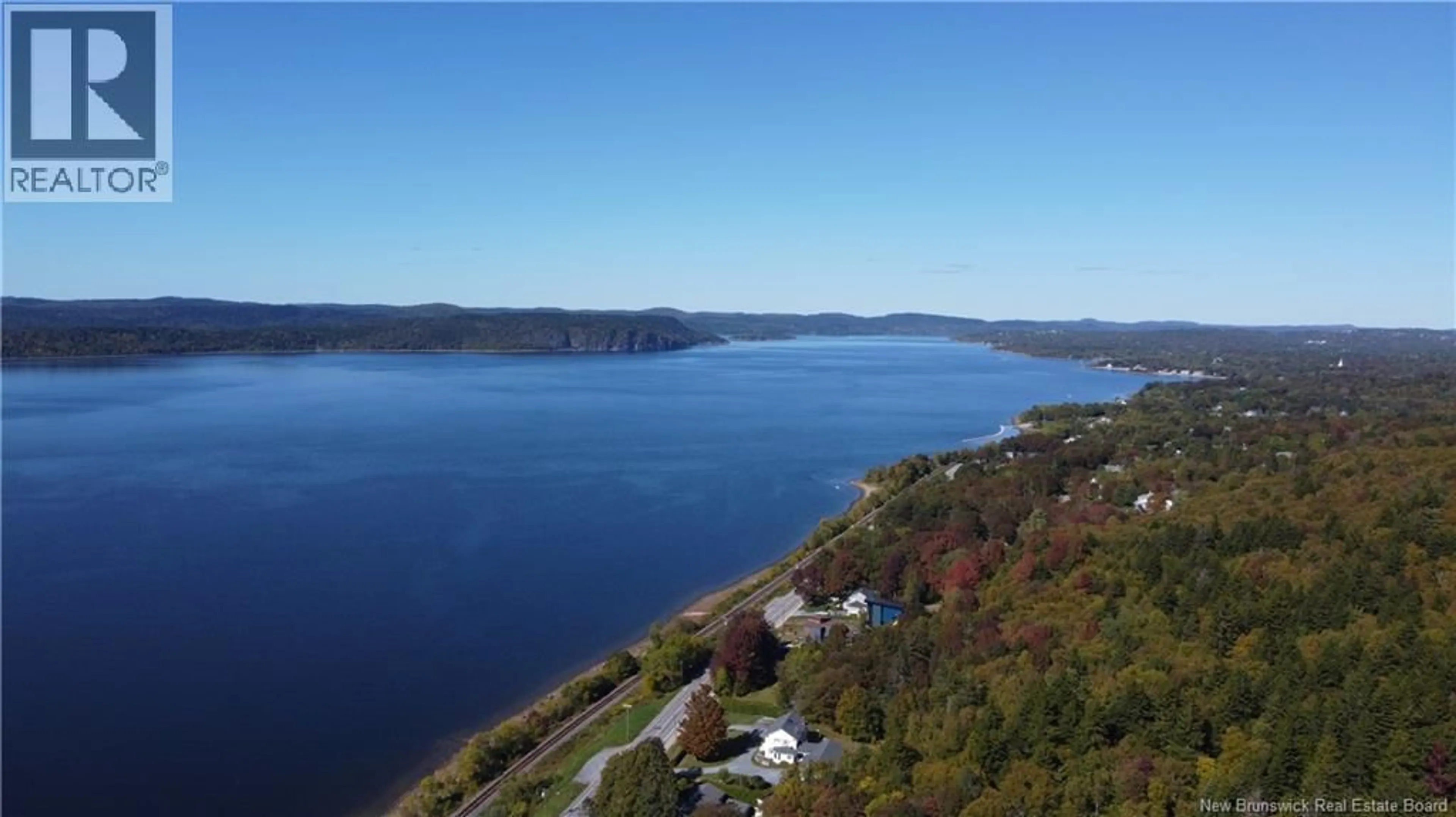 A pic from outside/outdoor area/front of a property/back of a property/a pic from drone, water/lake/river/ocean view for 15 HAZEN AVENUE, Rothesay New Brunswick E2H1N9