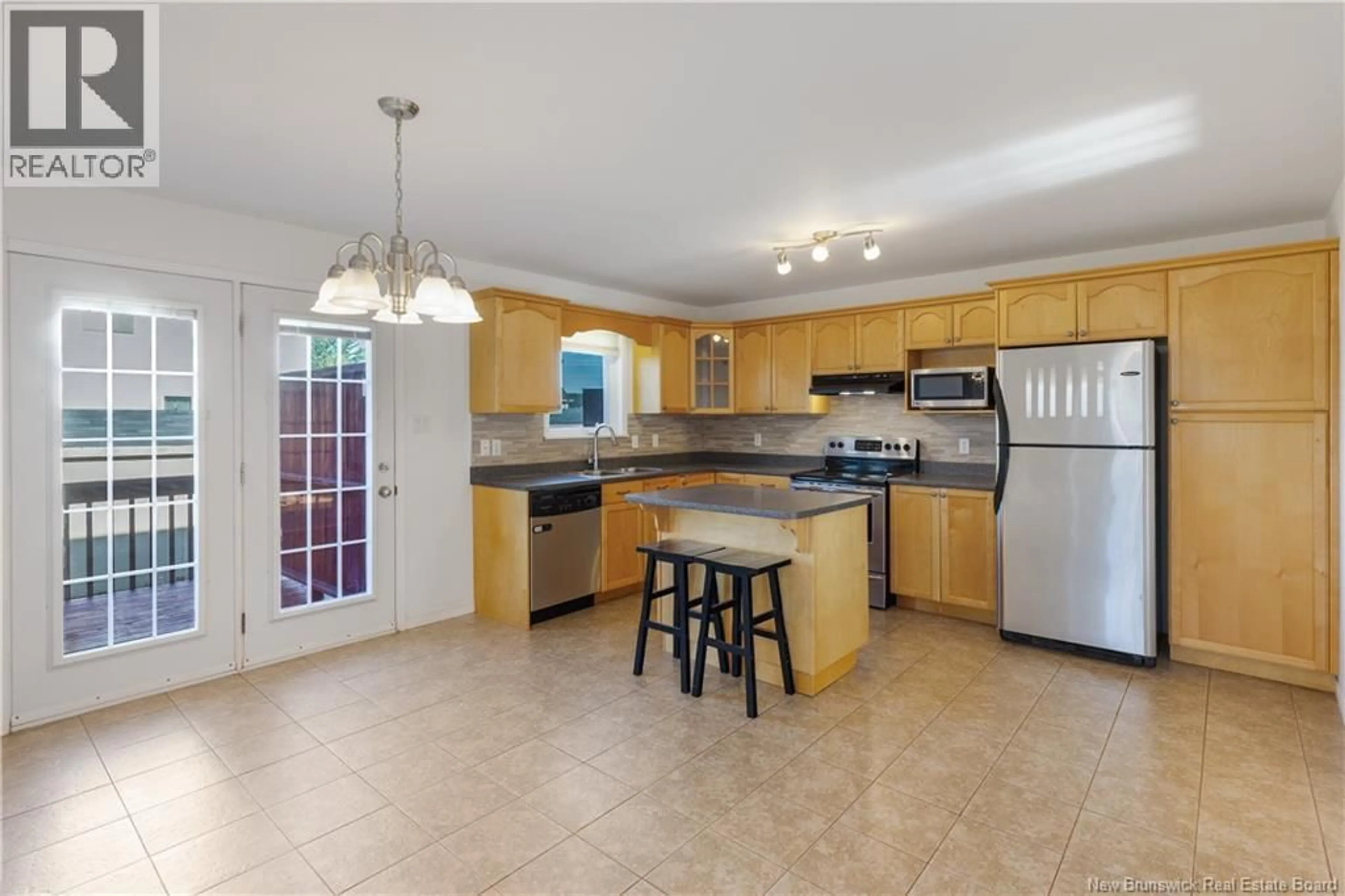 Open concept kitchen, ceramic/tile floor for 77 STONEHAM DRIVE, Moncton New Brunswick E1G4Z5