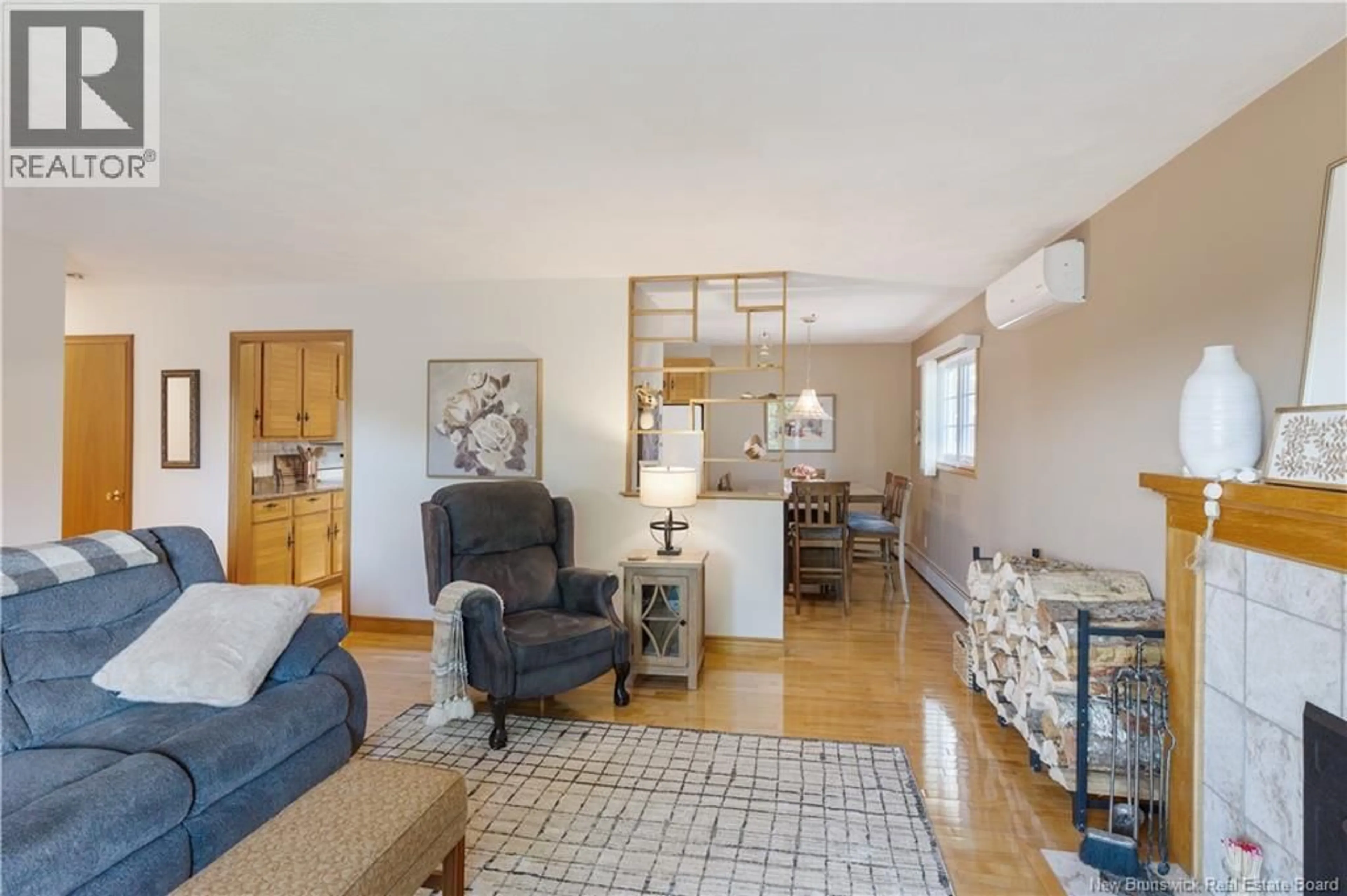 Living room with furniture, wood/laminate floor for 62 AYER AVENUE, Moncton New Brunswick E1C8J8