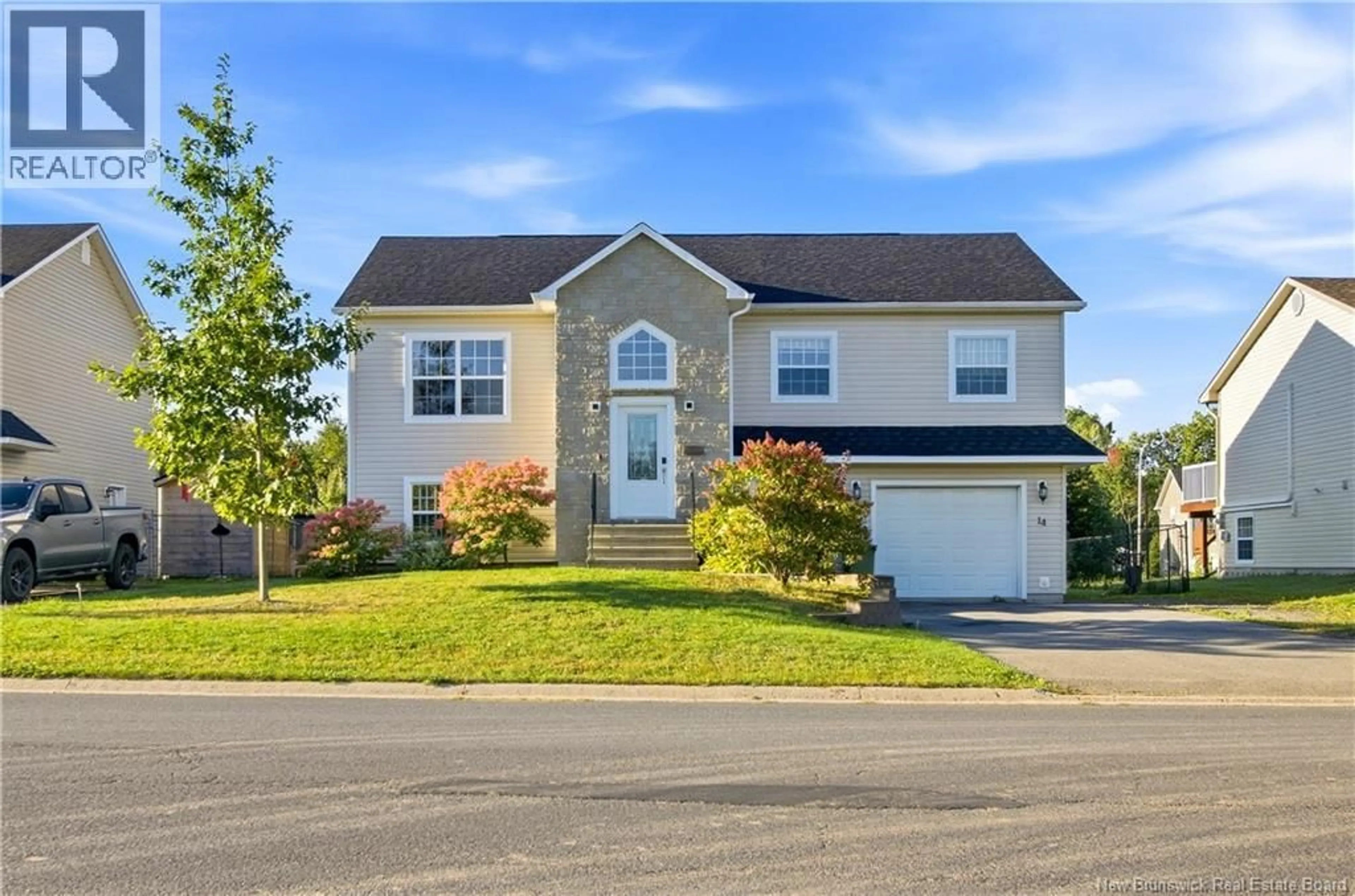 Home with vinyl exterior material, street for 14 HALLIHAN DRIVE, Oromocto New Brunswick E2V0C5