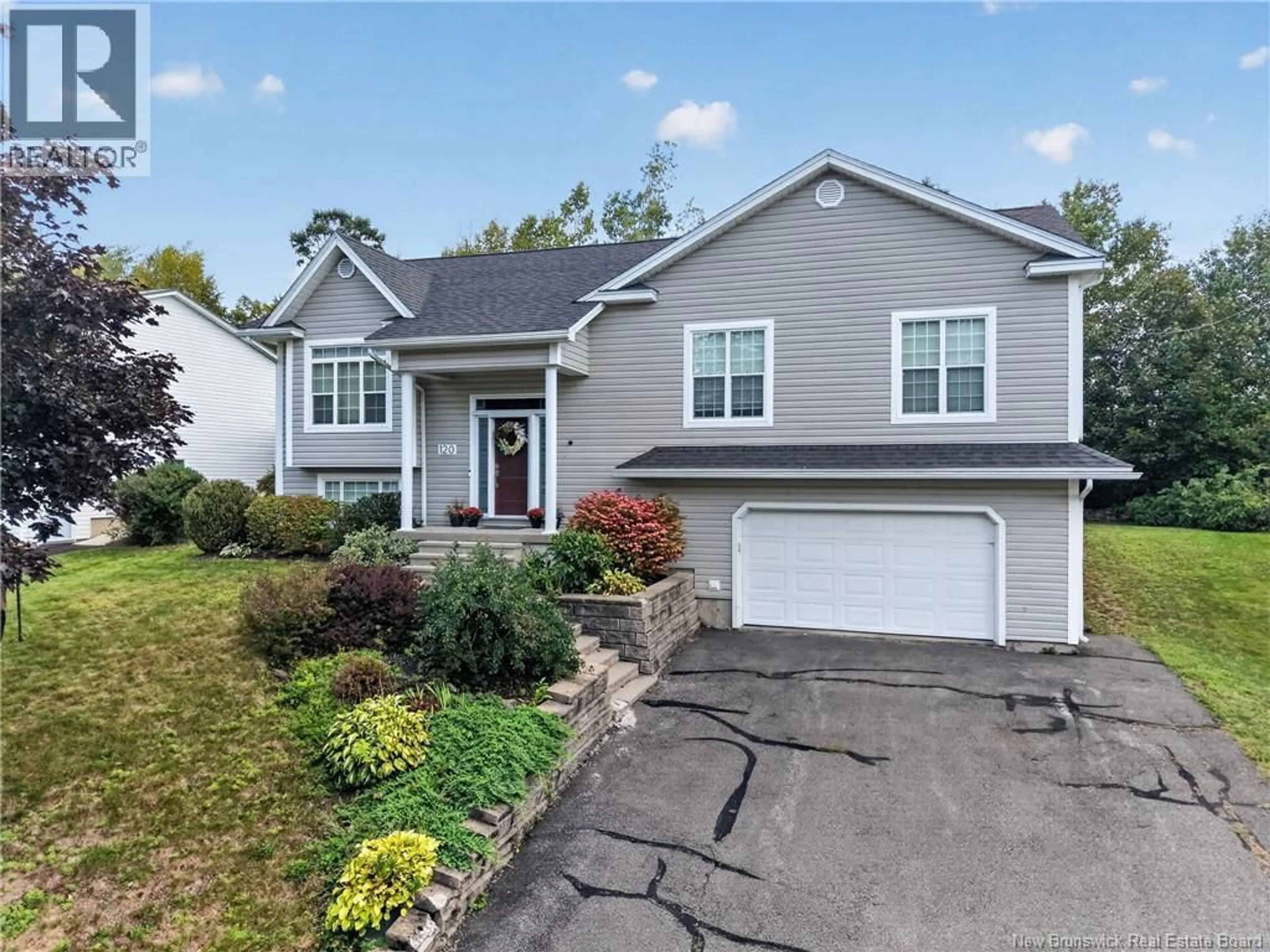 Home with vinyl exterior material, street for 120 WIGGINS DRIVE, Fredericton New Brunswick E3A5N7