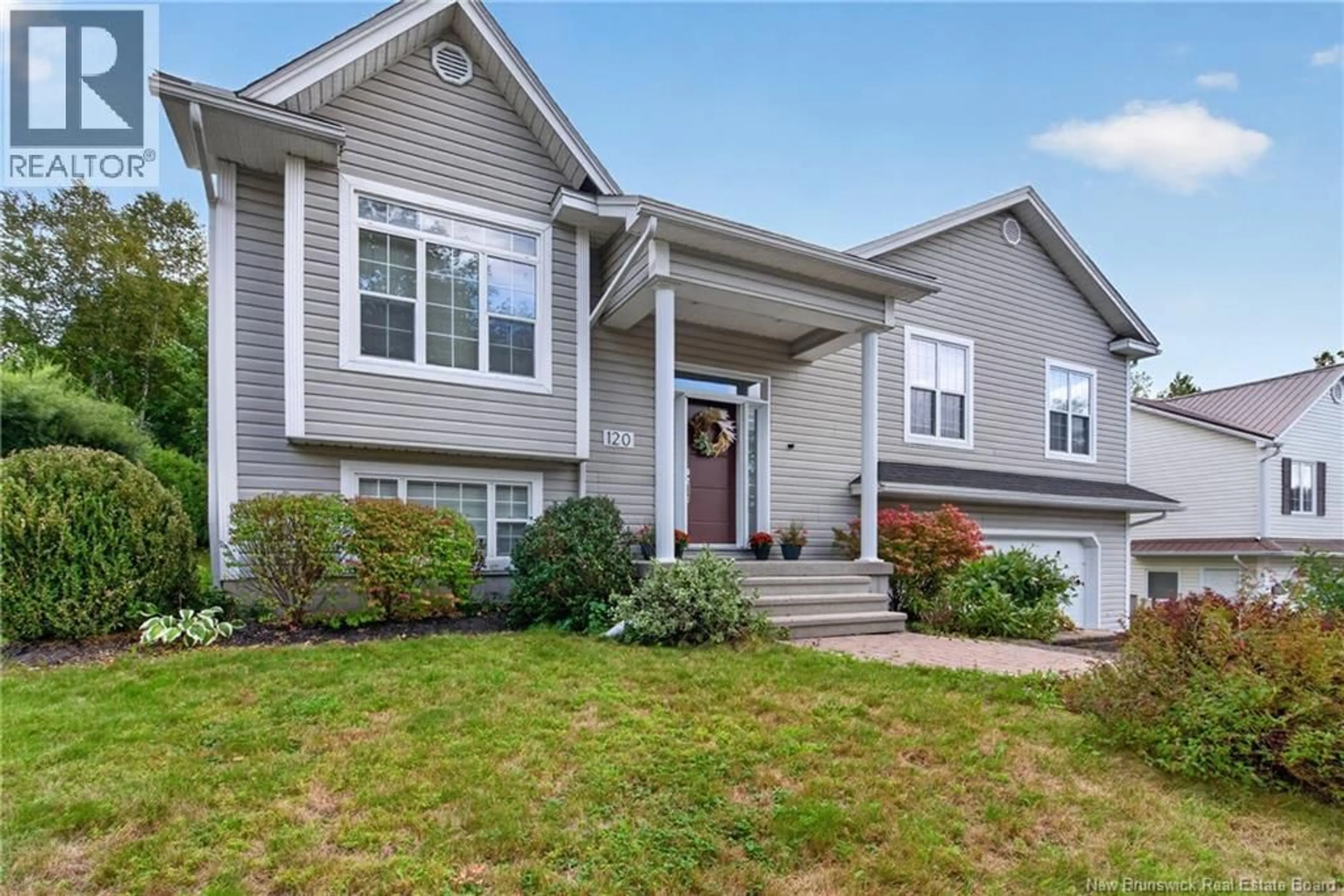 Home with vinyl exterior material, street for 120 WIGGINS DRIVE, Fredericton New Brunswick E3A5N7