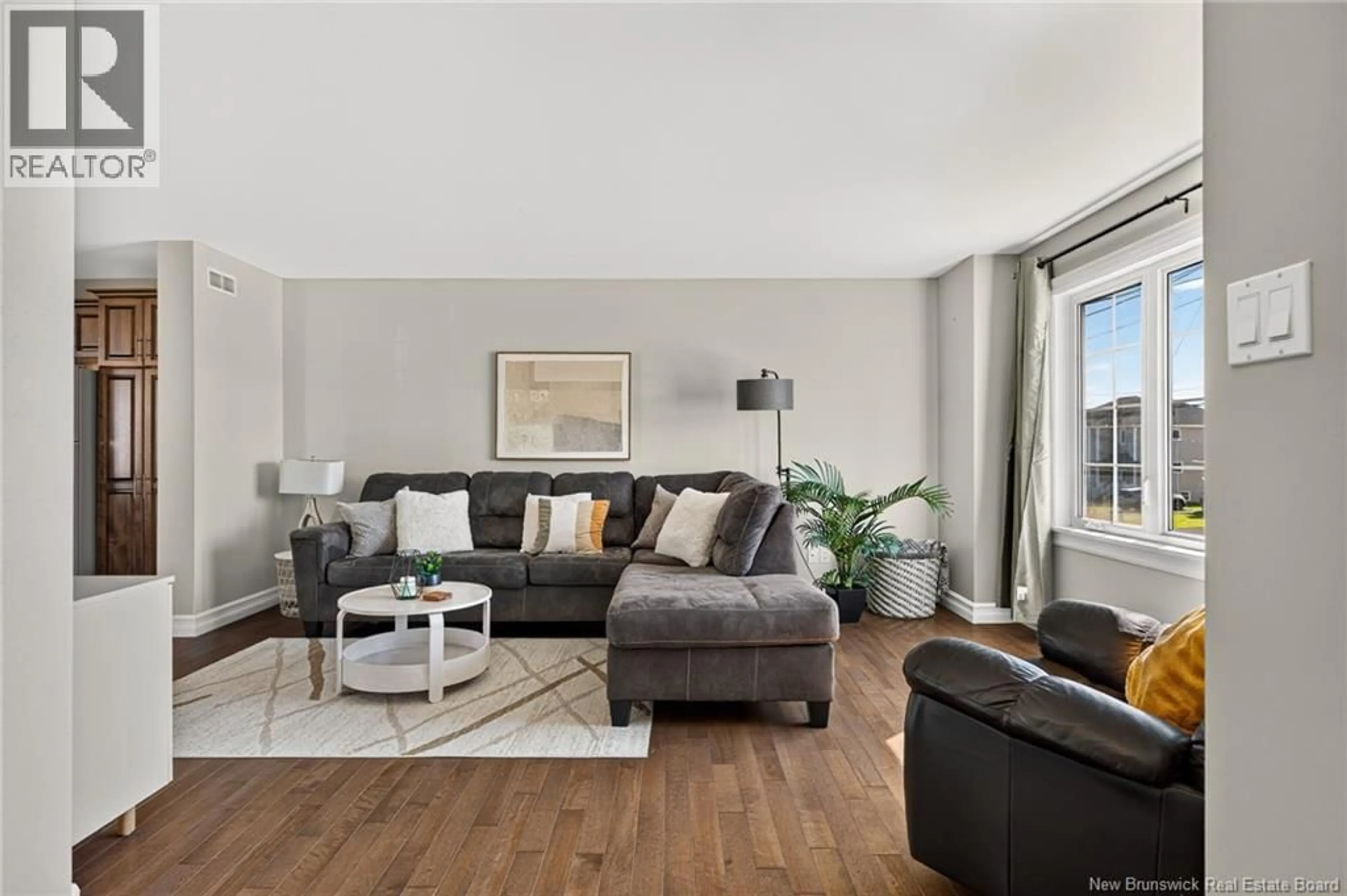 Living room with furniture, wood/laminate floor for 35 RUBY WAY, Moncton New Brunswick E1E0H4