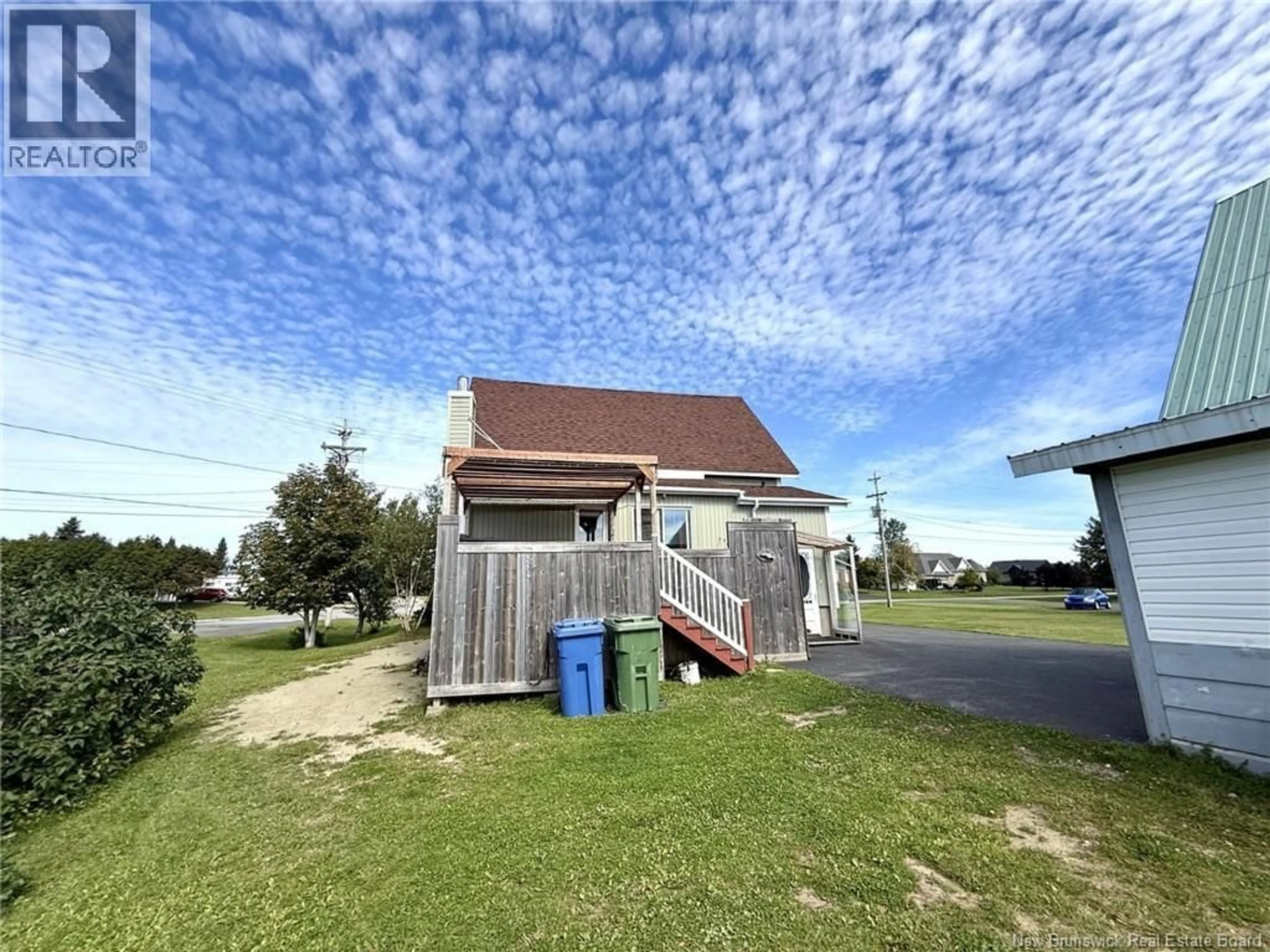 A pic from outside/outdoor area/front of a property/back of a property/a pic from drone, unknown for 133 RUE DU BASSIN, Lamèque New Brunswick E8T1H6