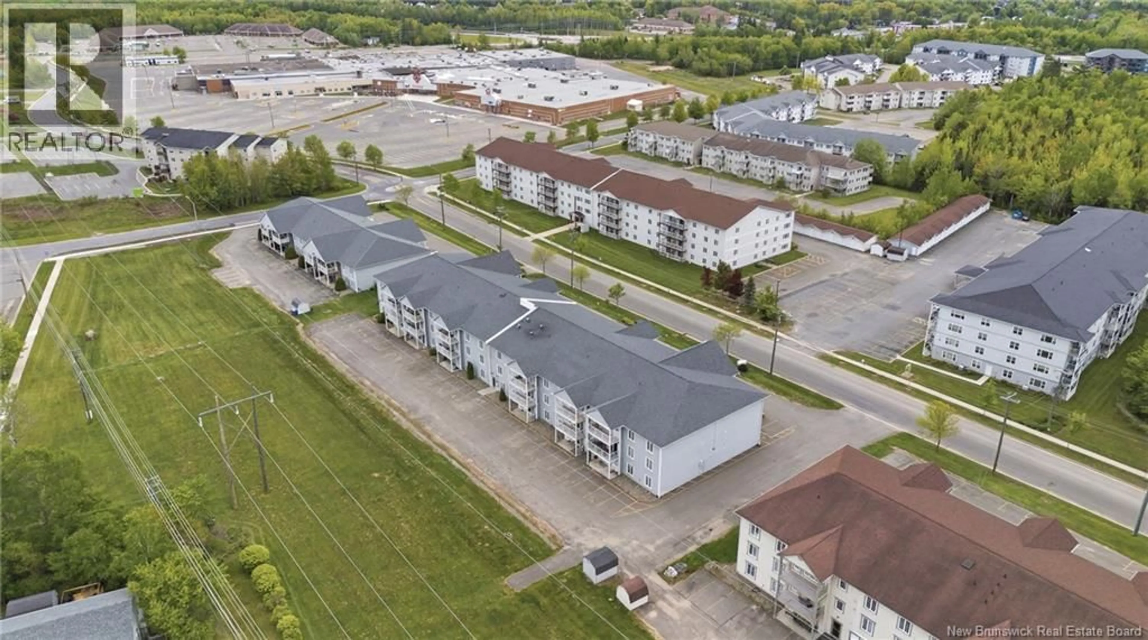 A pic from outside/outdoor area/front of a property/back of a property/a pic from drone, building for 14 - 185 REYNOLDS STREET, Fredericton New Brunswick E3A0K7