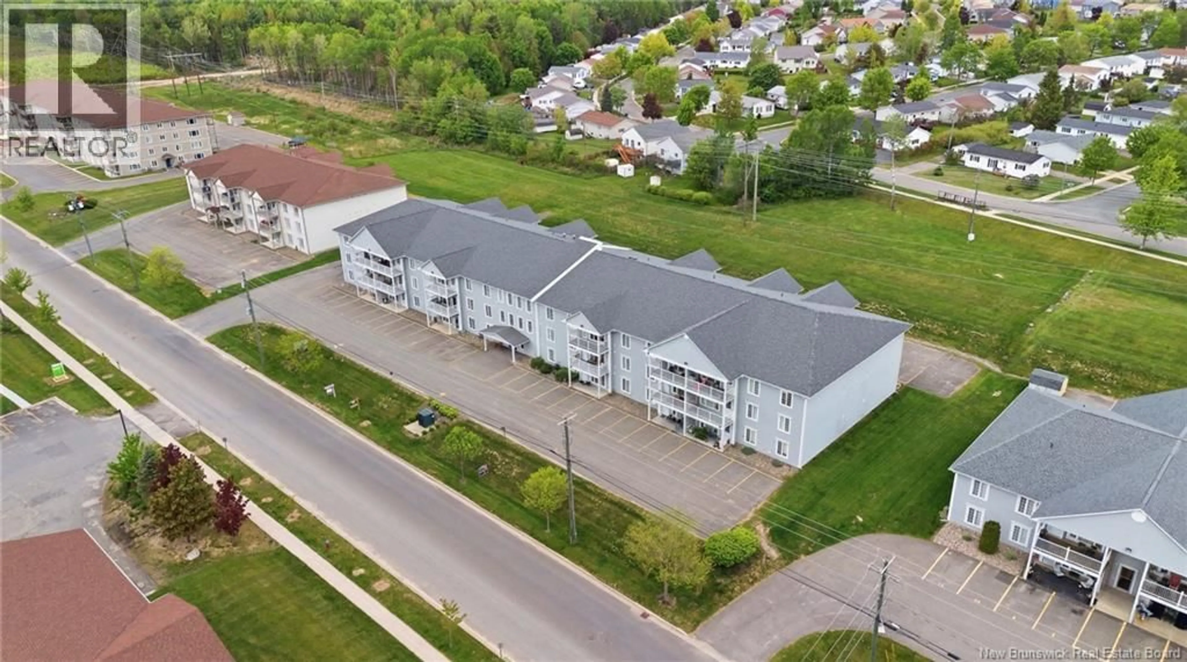 A pic from outside/outdoor area/front of a property/back of a property/a pic from drone, building for 14 - 185 REYNOLDS STREET, Fredericton New Brunswick E3A0K7