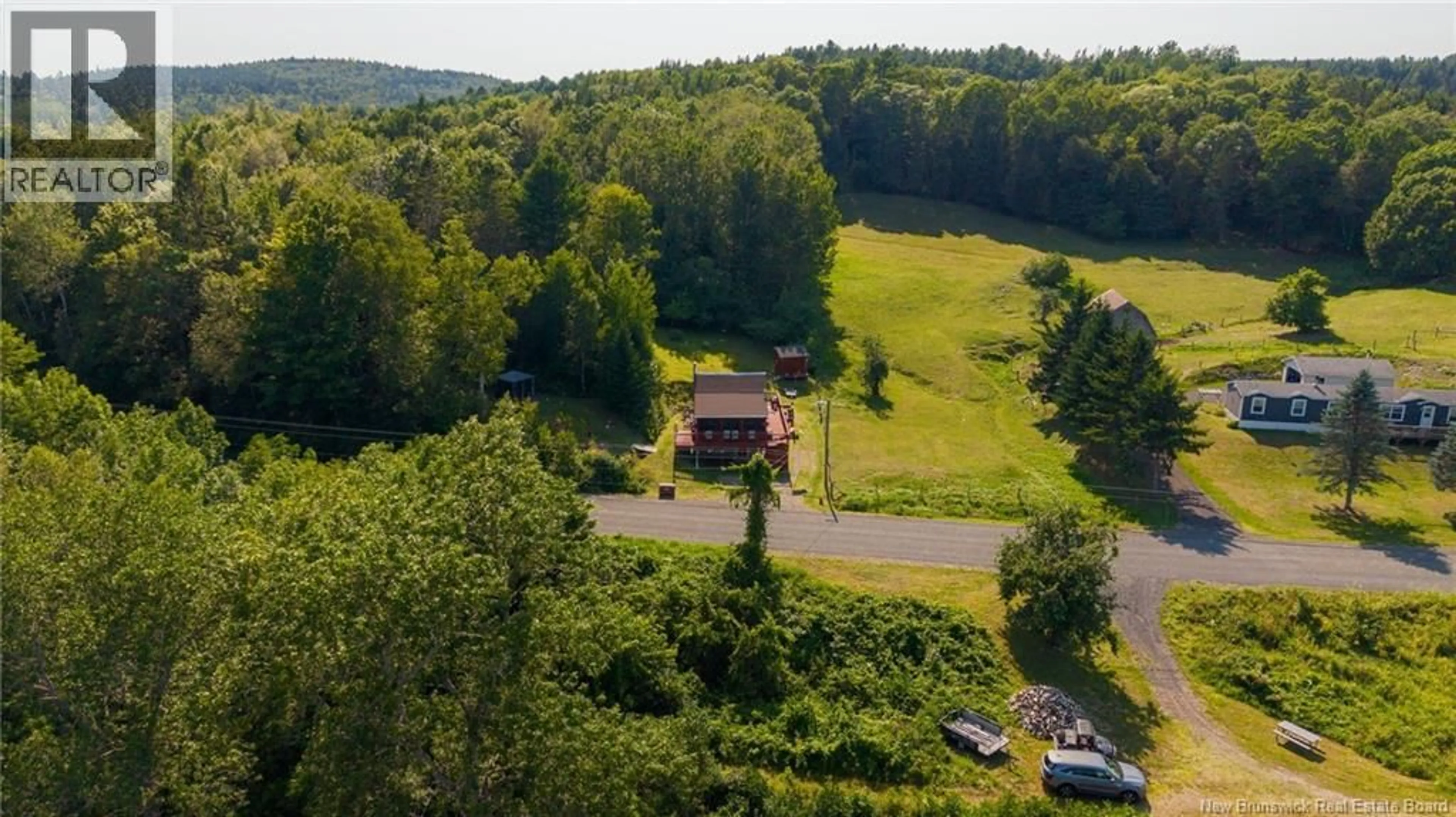 A pic from outside/outdoor area/front of a property/back of a property/a pic from drone, unknown for 5364 ROUTE 102, Hampstead New Brunswick E5M2C4