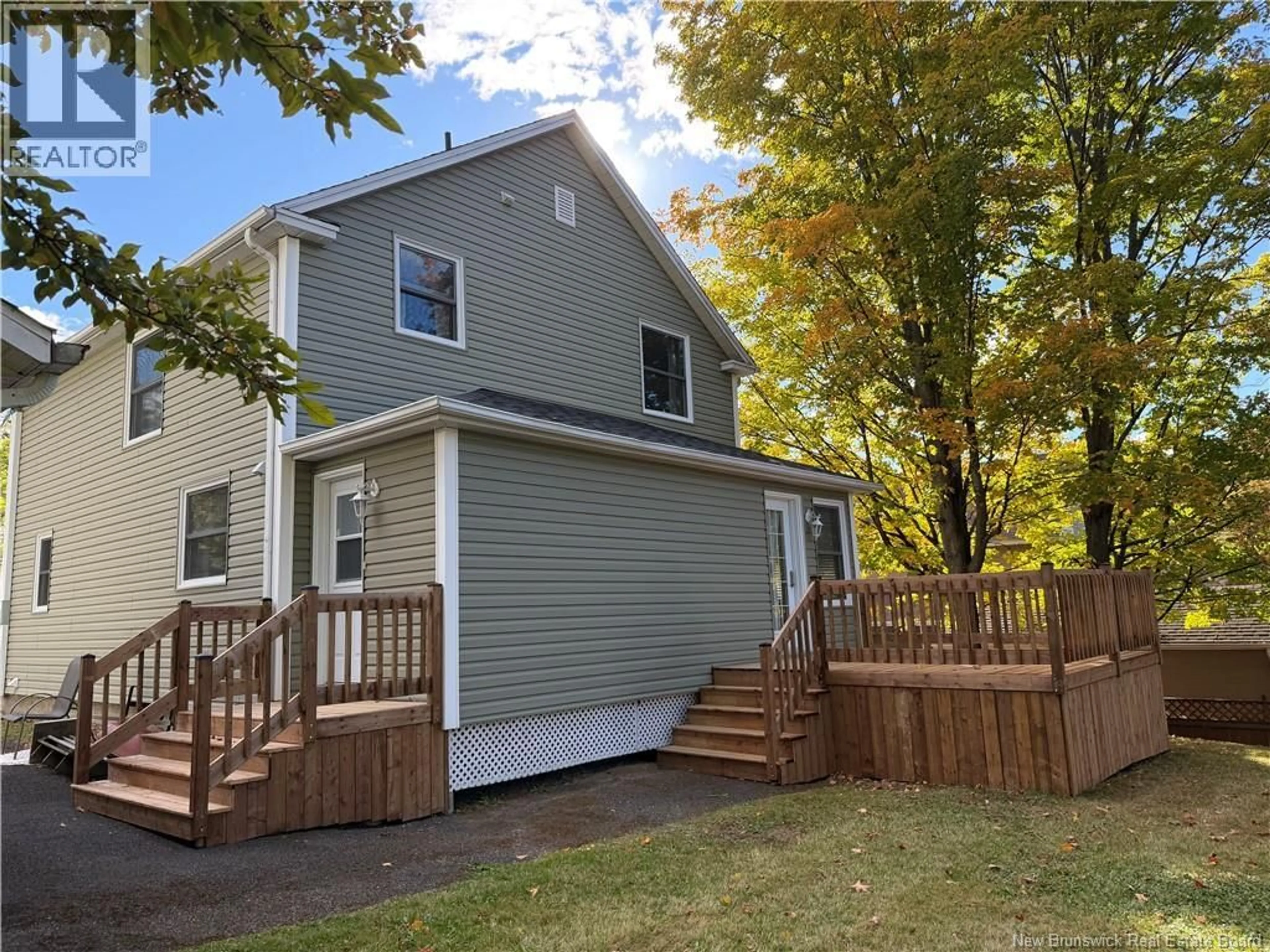 Home with vinyl exterior material, street for 25 PARK STREET, Edmundston New Brunswick E3V1Y8