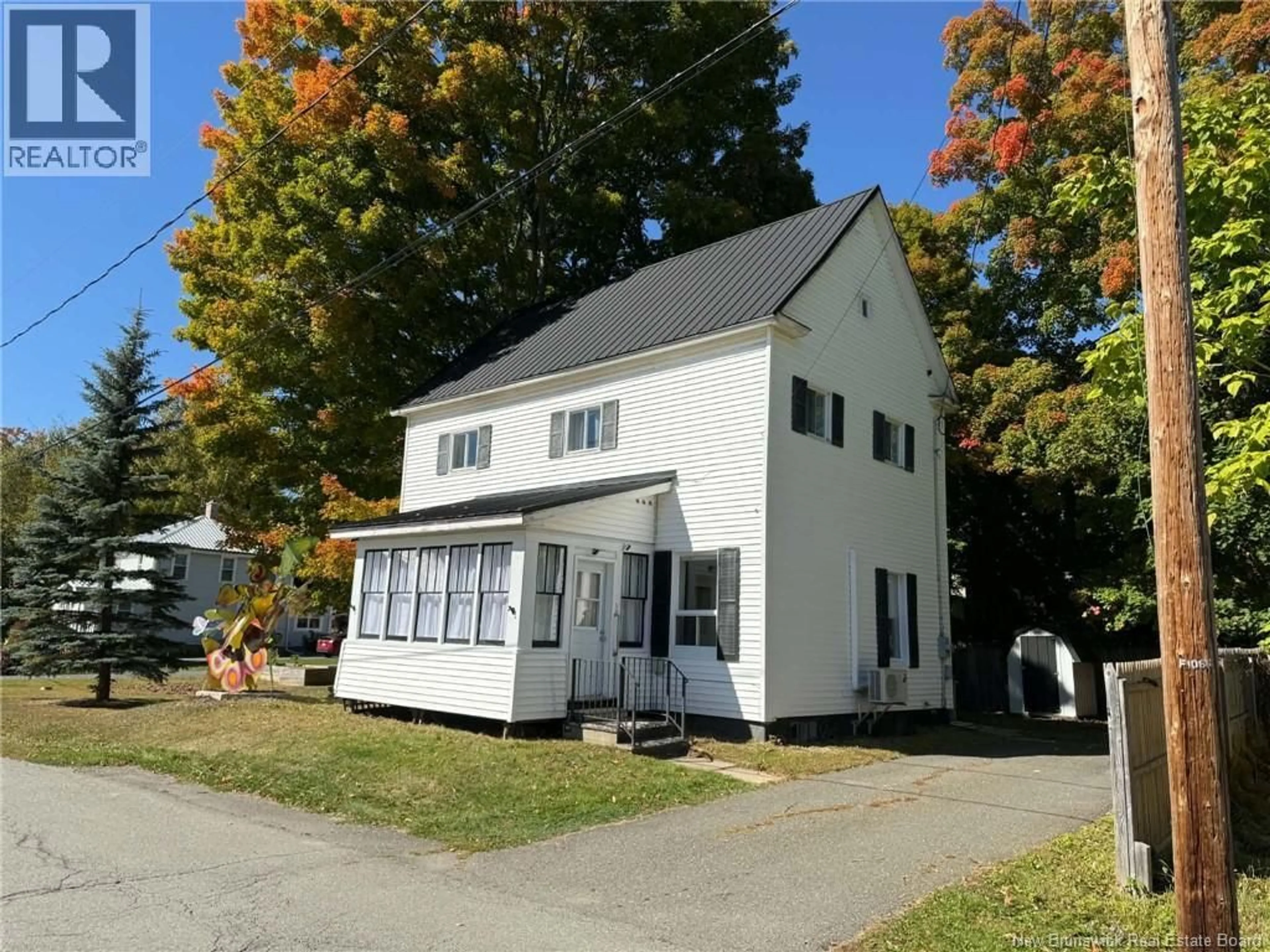 Home with vinyl exterior material, street for 106 COLLEGE STREET, Woodstock New Brunswick E7M1K6
